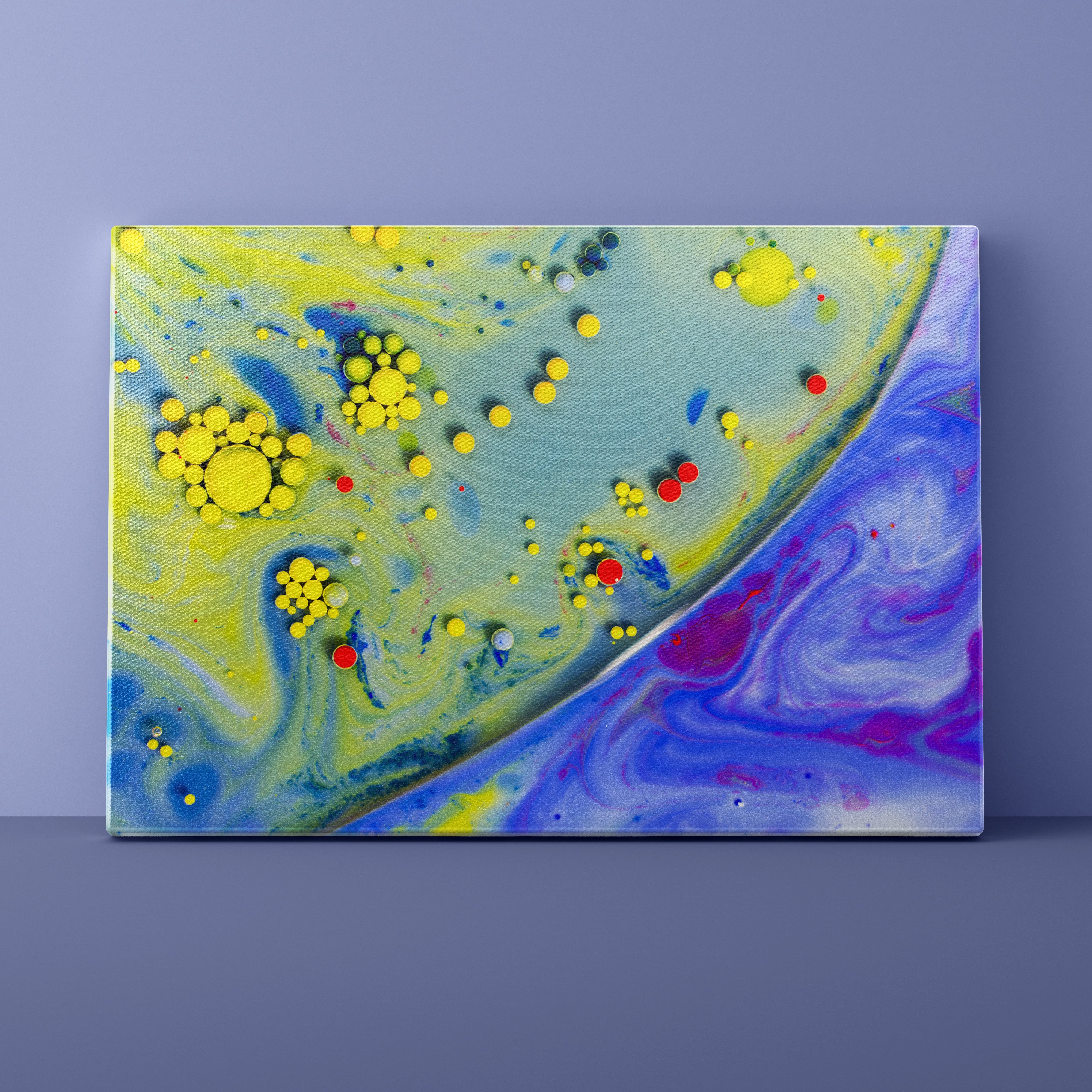 Abstract art canvas with colorful splashes on a purple background