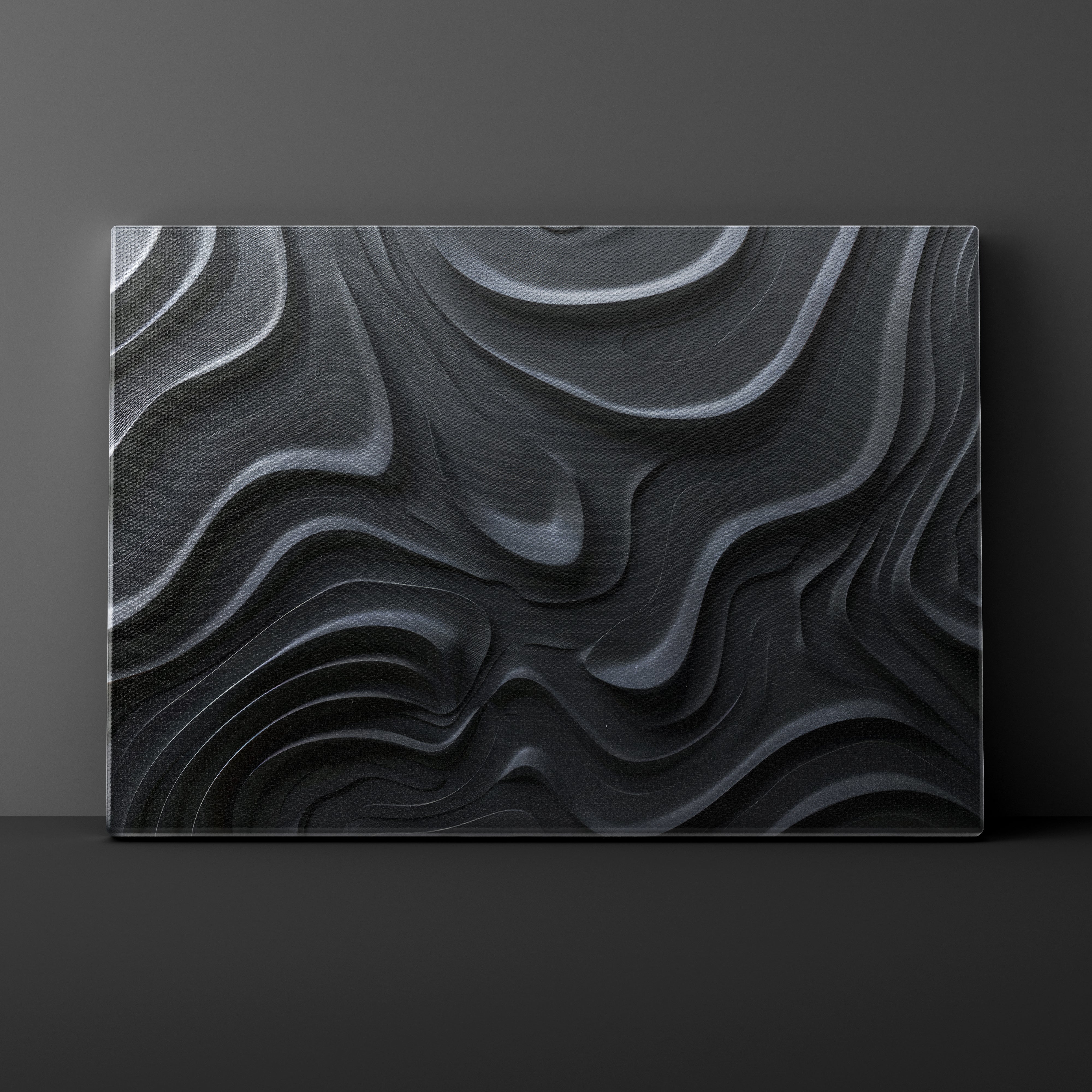 Abstract black and gray wavy pattern on a dark background