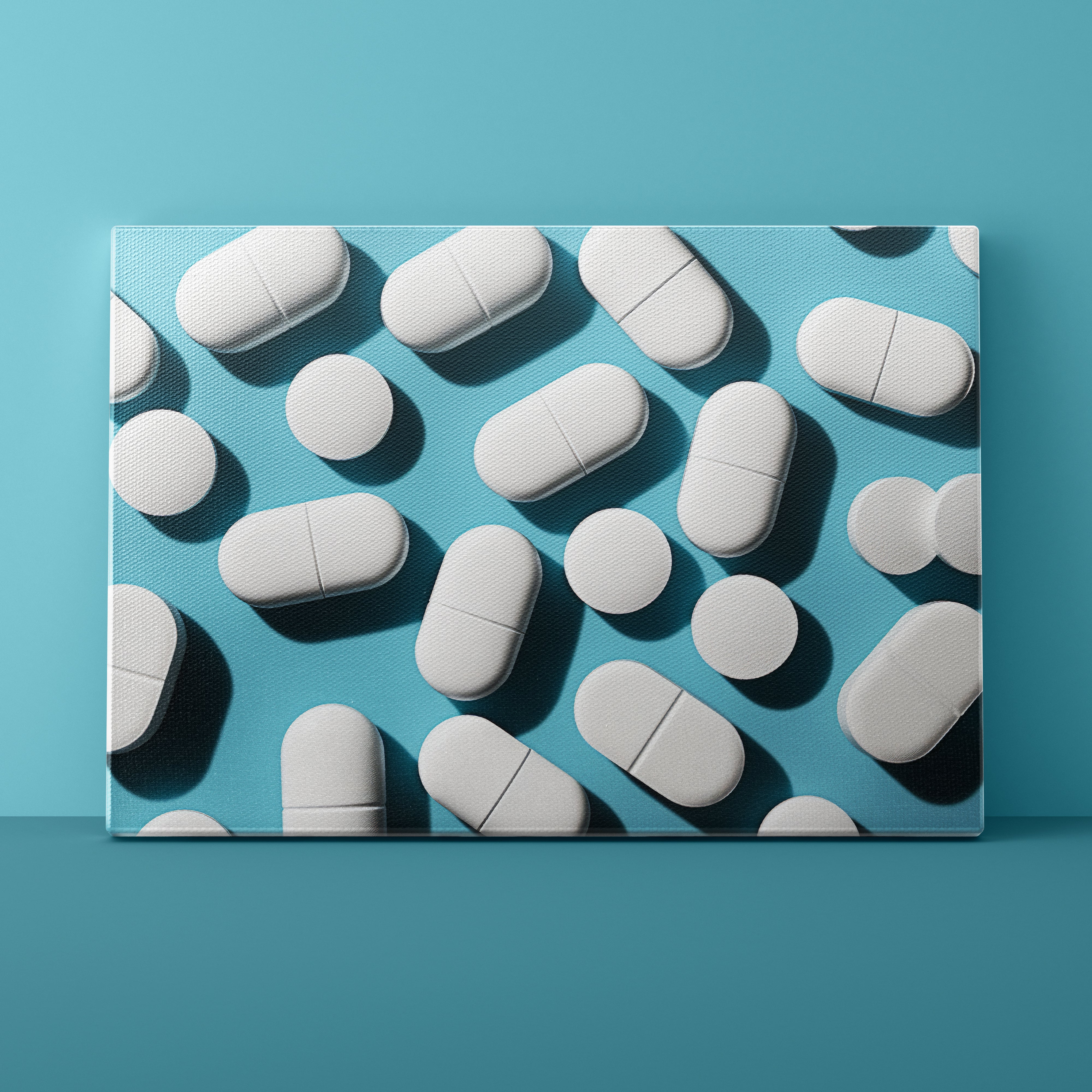White pills on a blue background