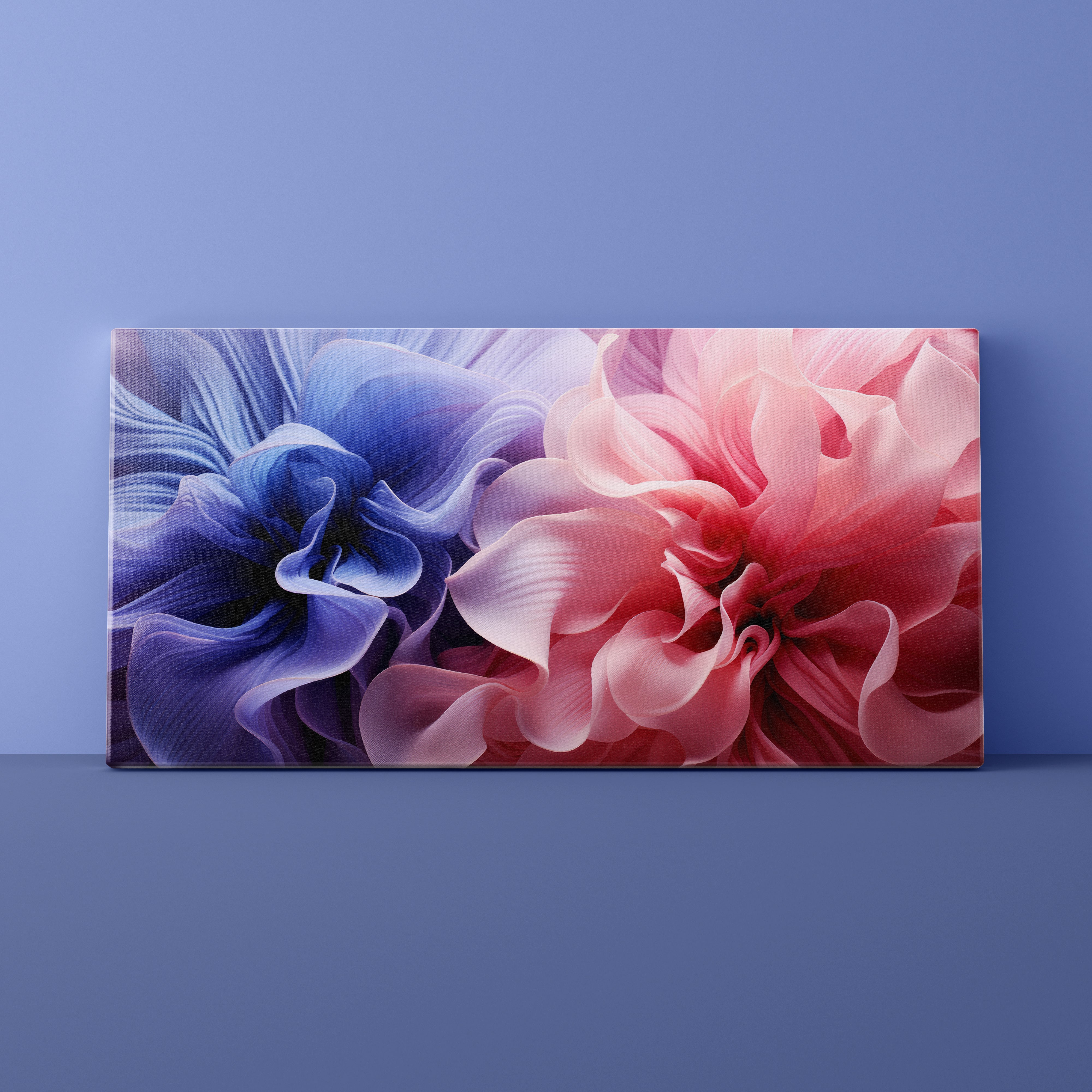 Canvas print with pink and blue abstract floral design on a blue wall.