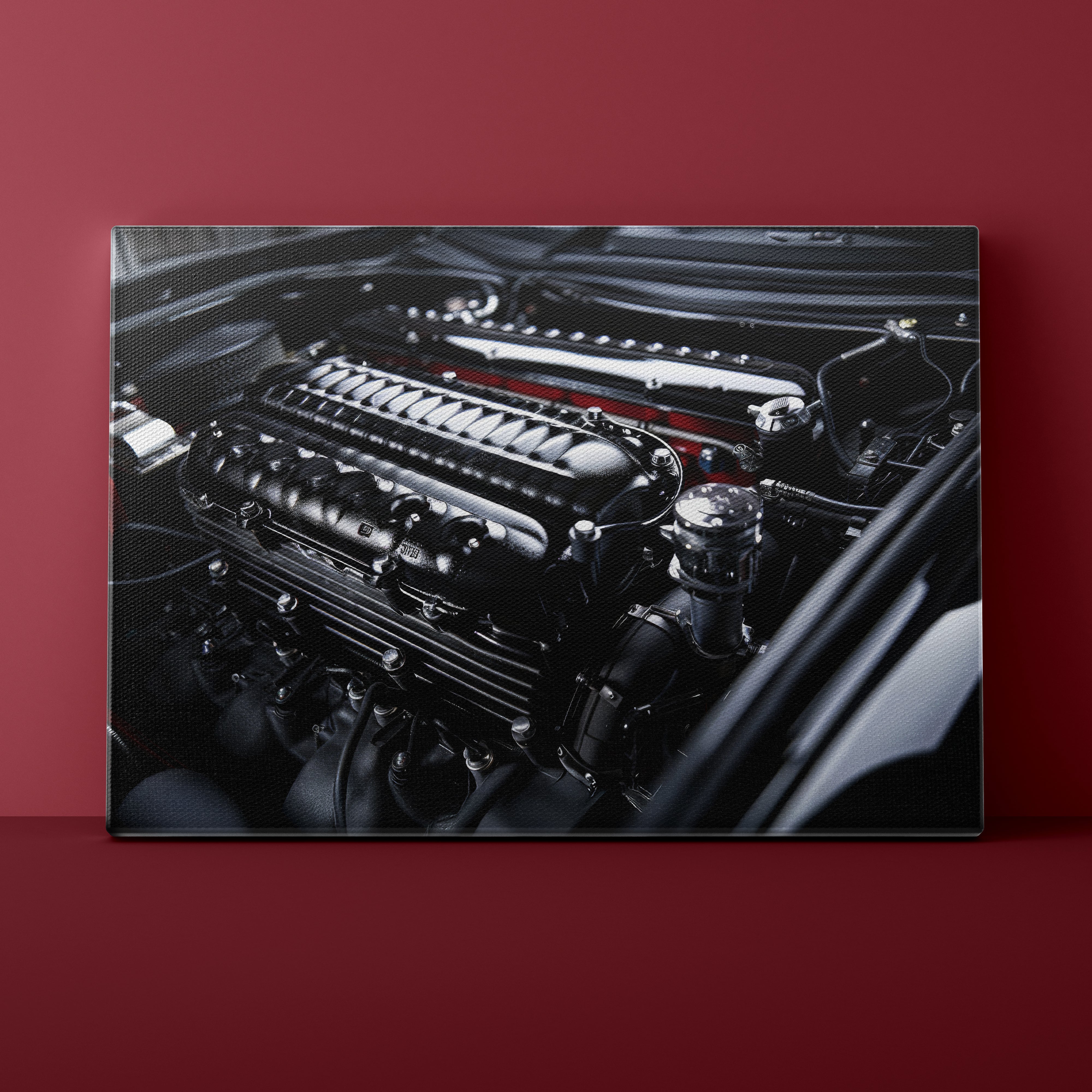 Close-up of a car engine on a red background