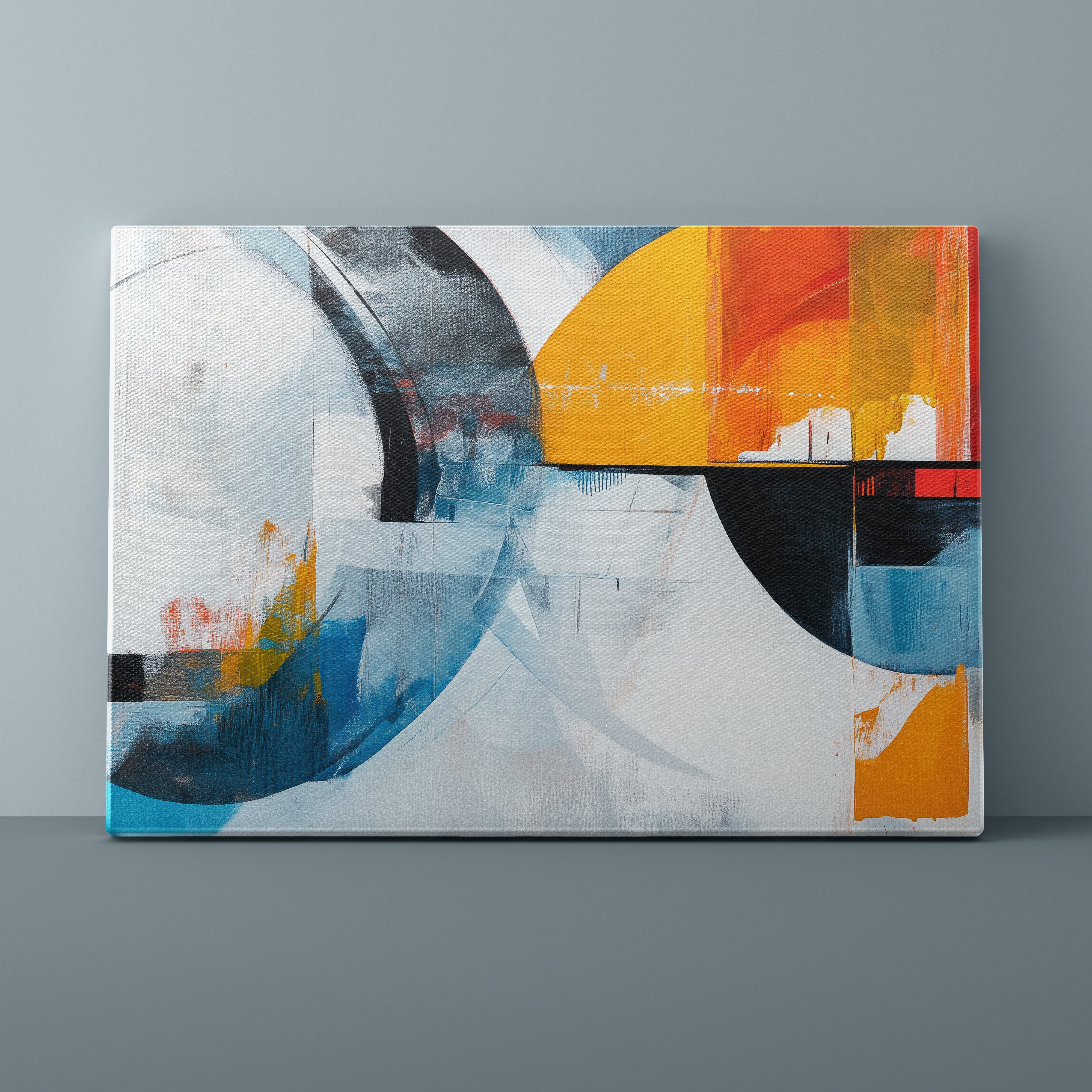 Abstract art painting with geometric shapes on a gray wall