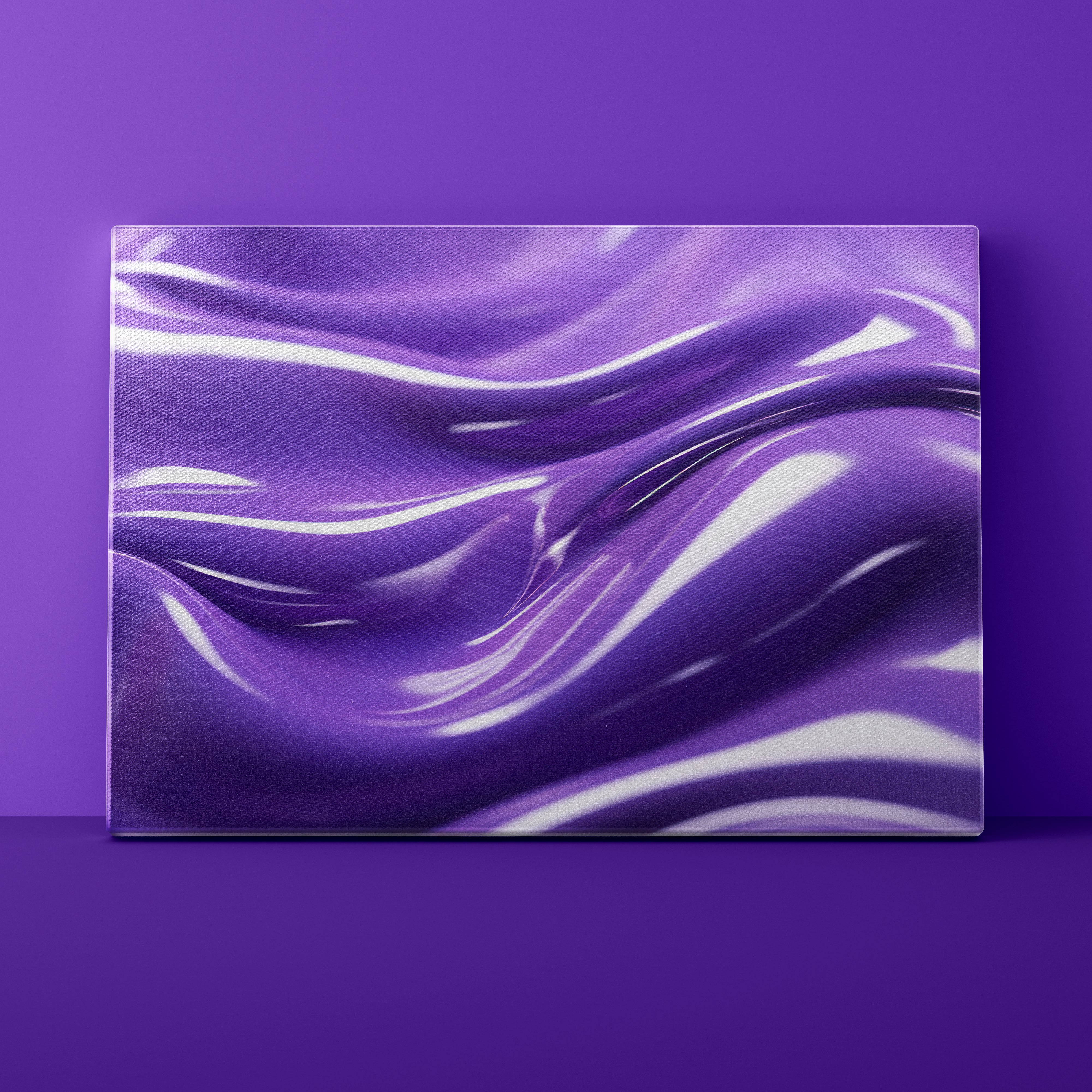 Purple fabric with wavy pattern on a purple background