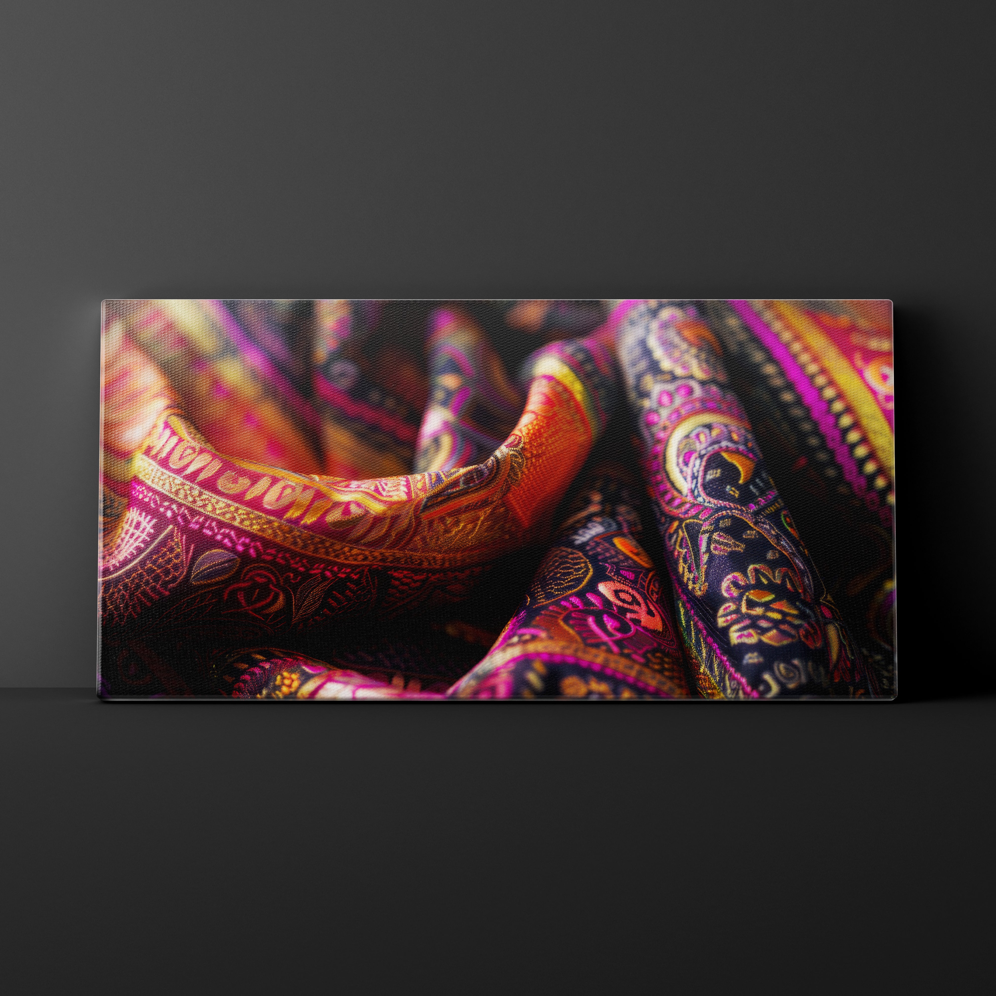 Colorful patterned fabric on a dark background