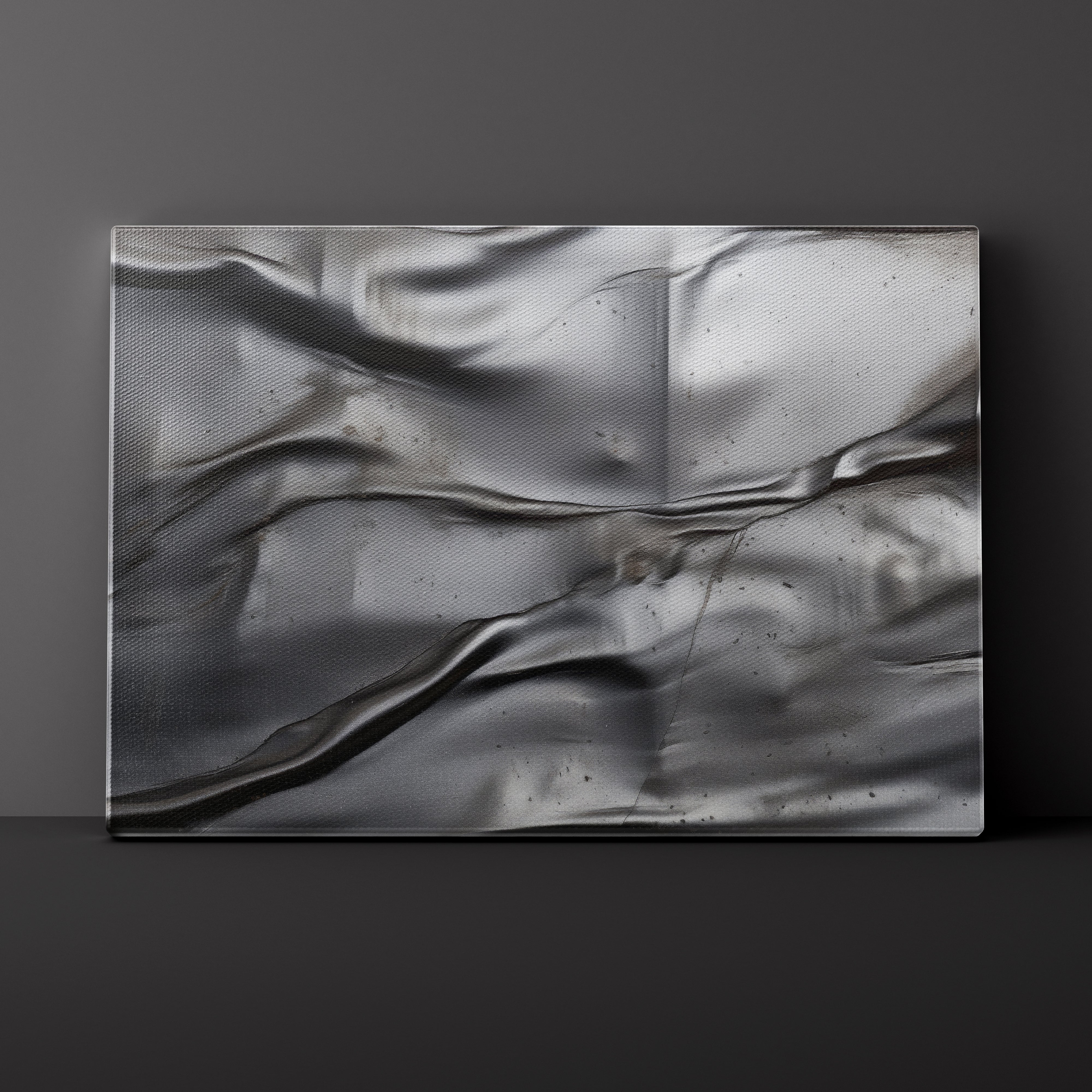 Abstract metallic texture artwork on a dark gray background