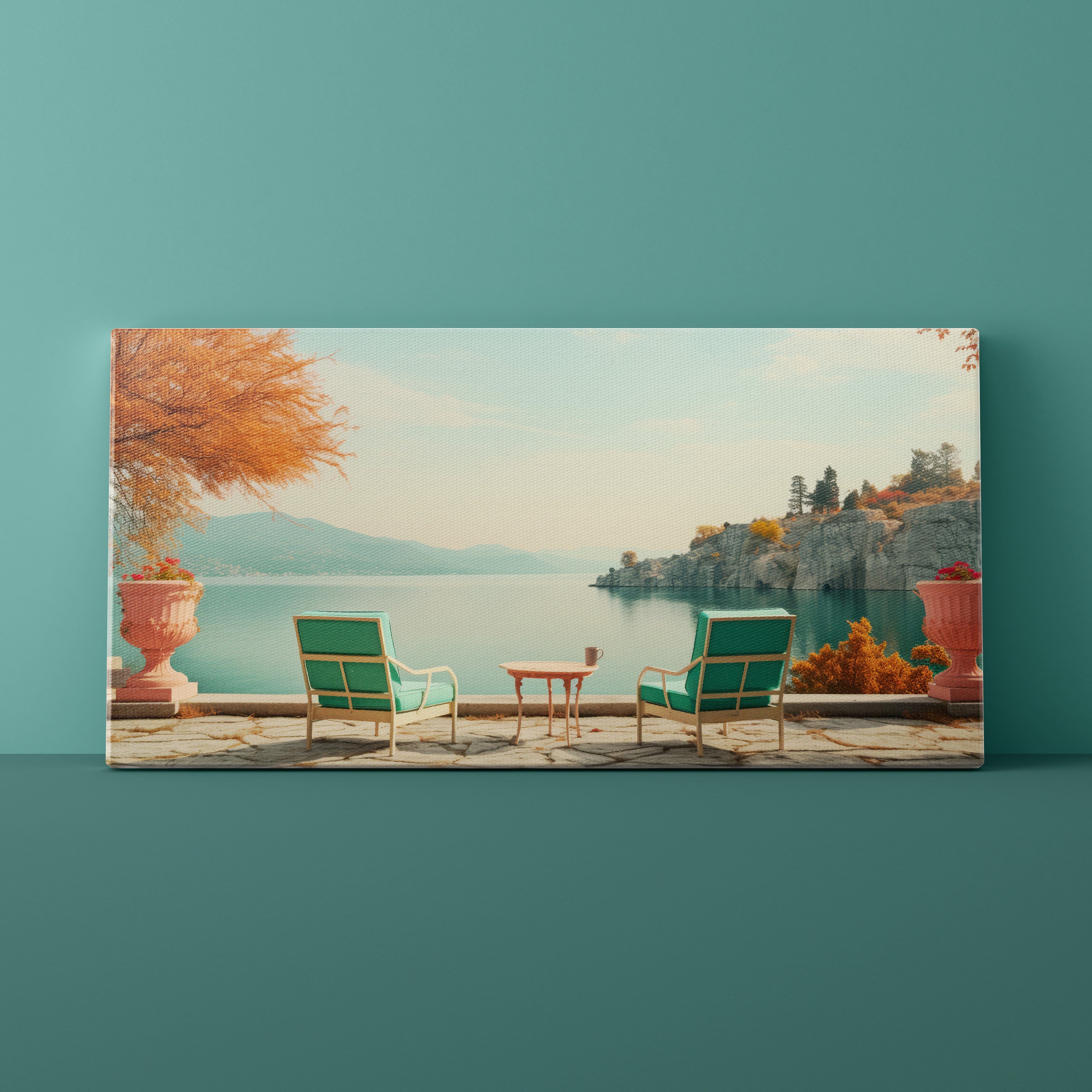 Canvas print of a scenic view with chairs and a table by a lake on a teal wall.