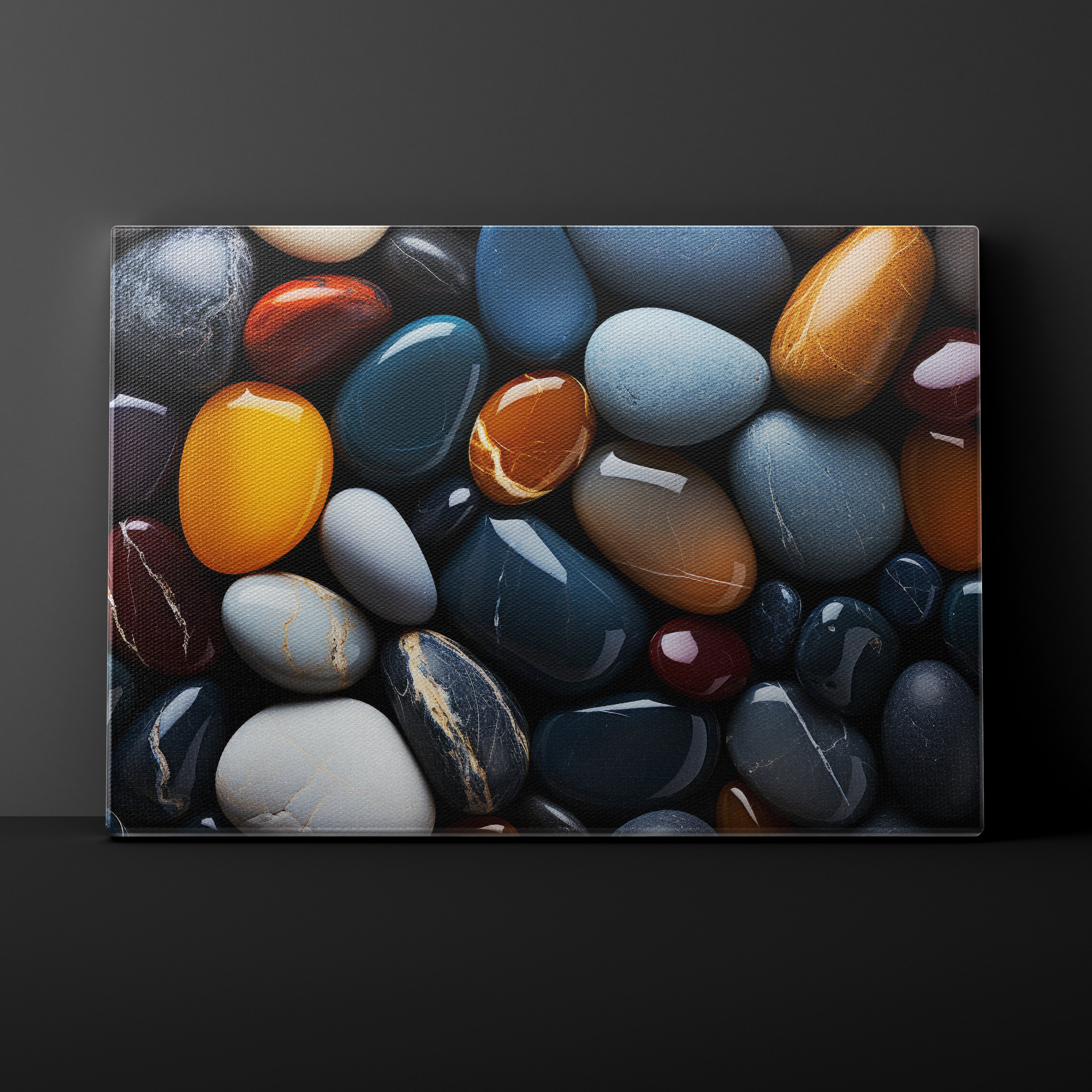 Colorful pebbles arranged in a pattern on a dark background