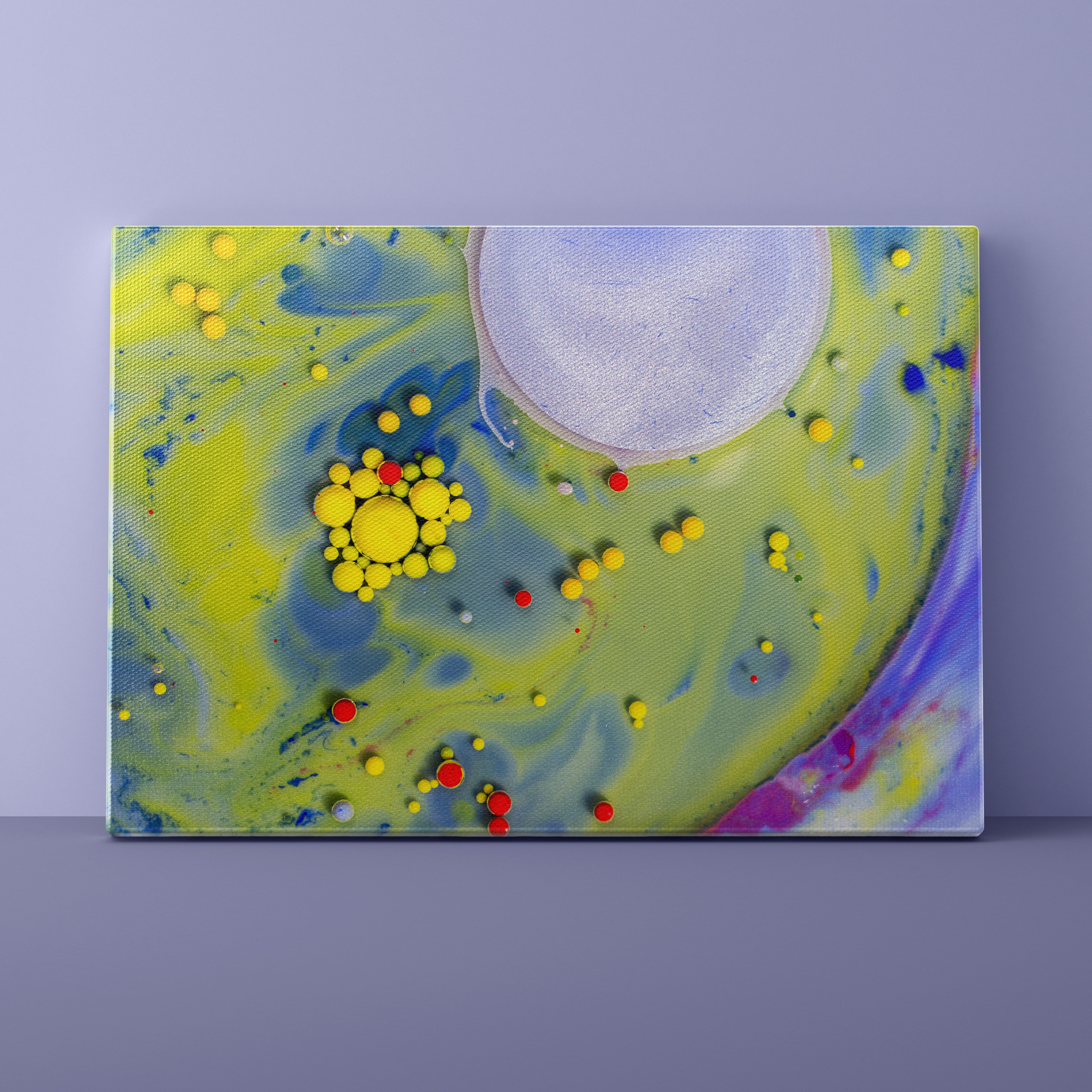 Colorful abstract painting with yellow, blue, and red dots on a purple background
