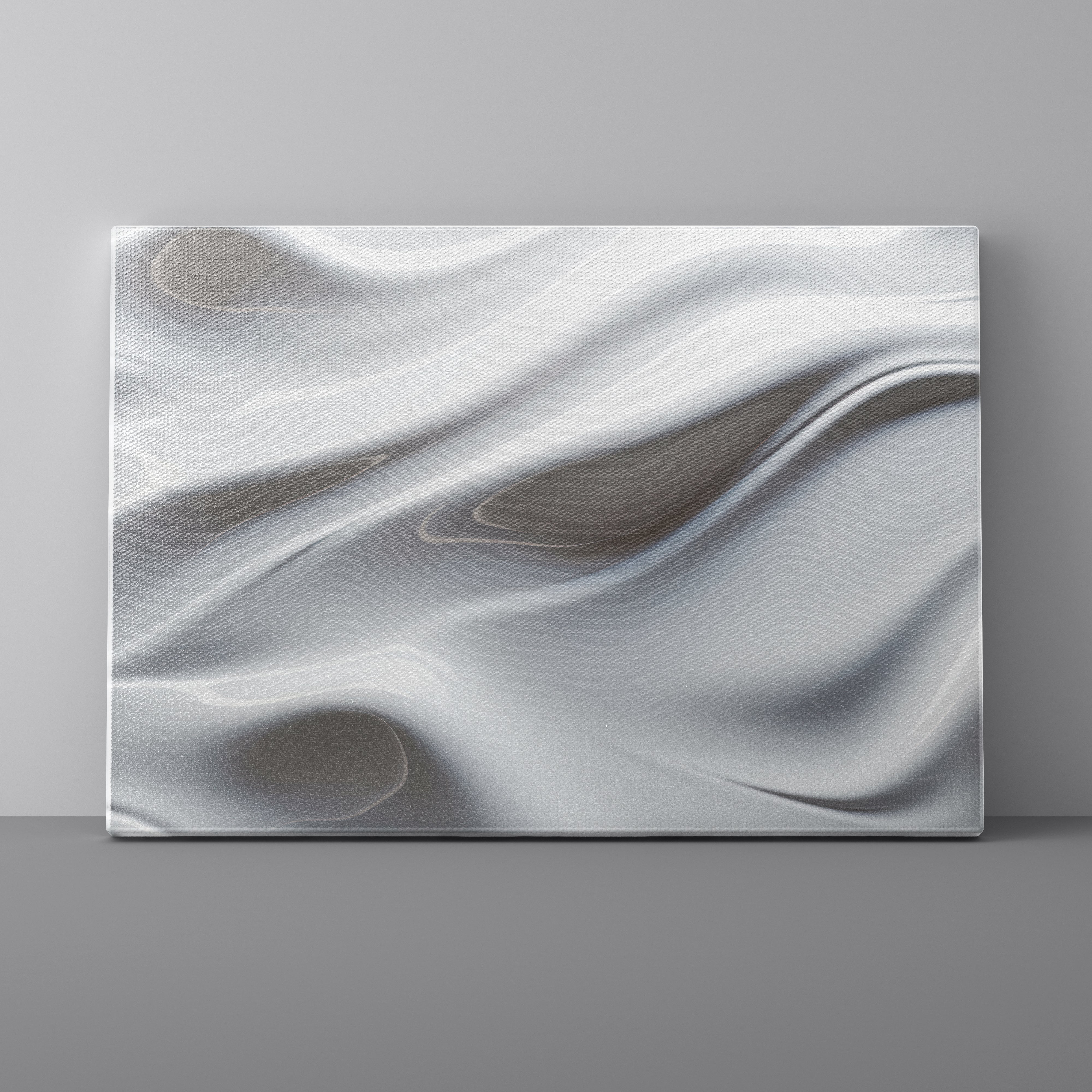 Canvas print of wavy white fabric on a gray background