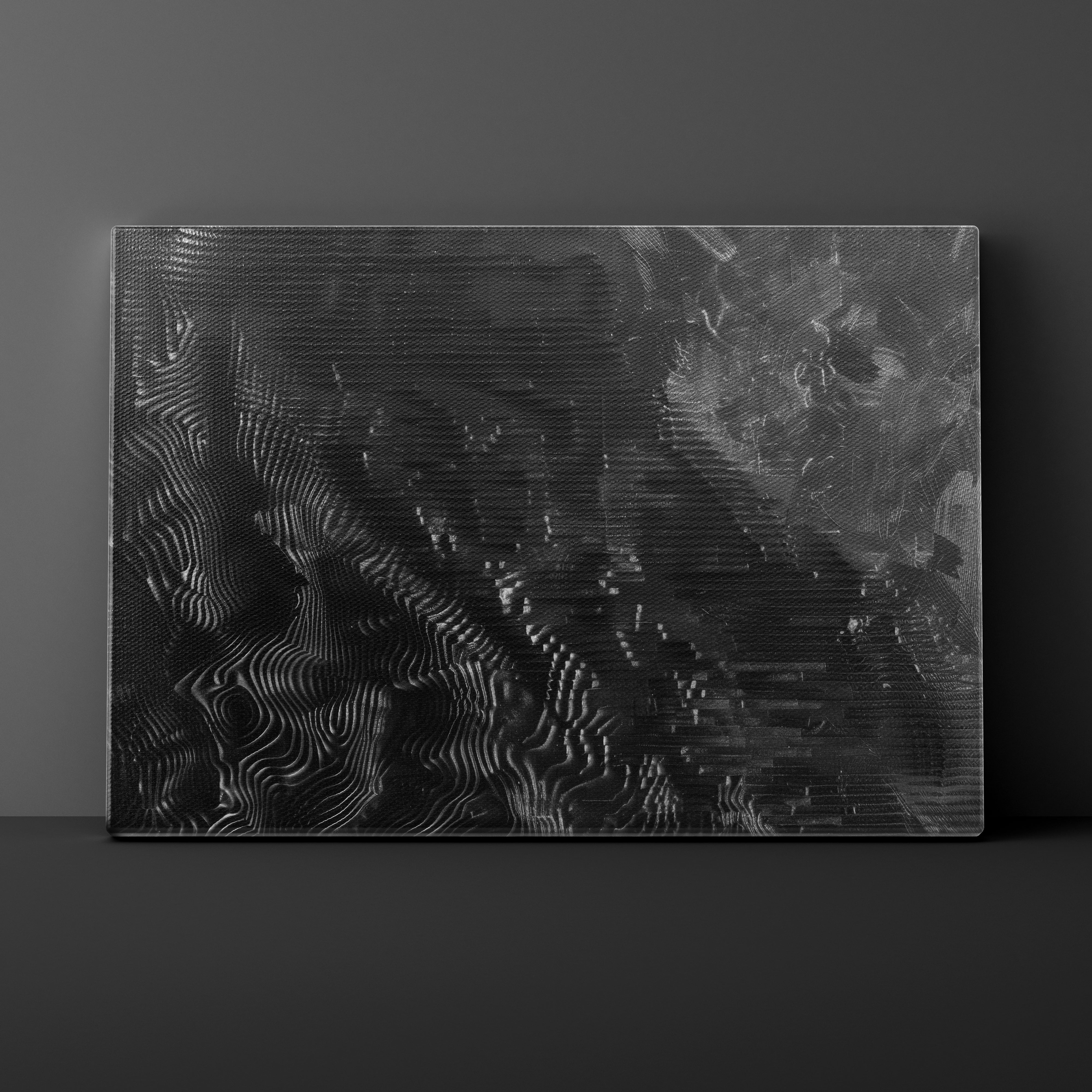 Textured black panel on a dark gray background