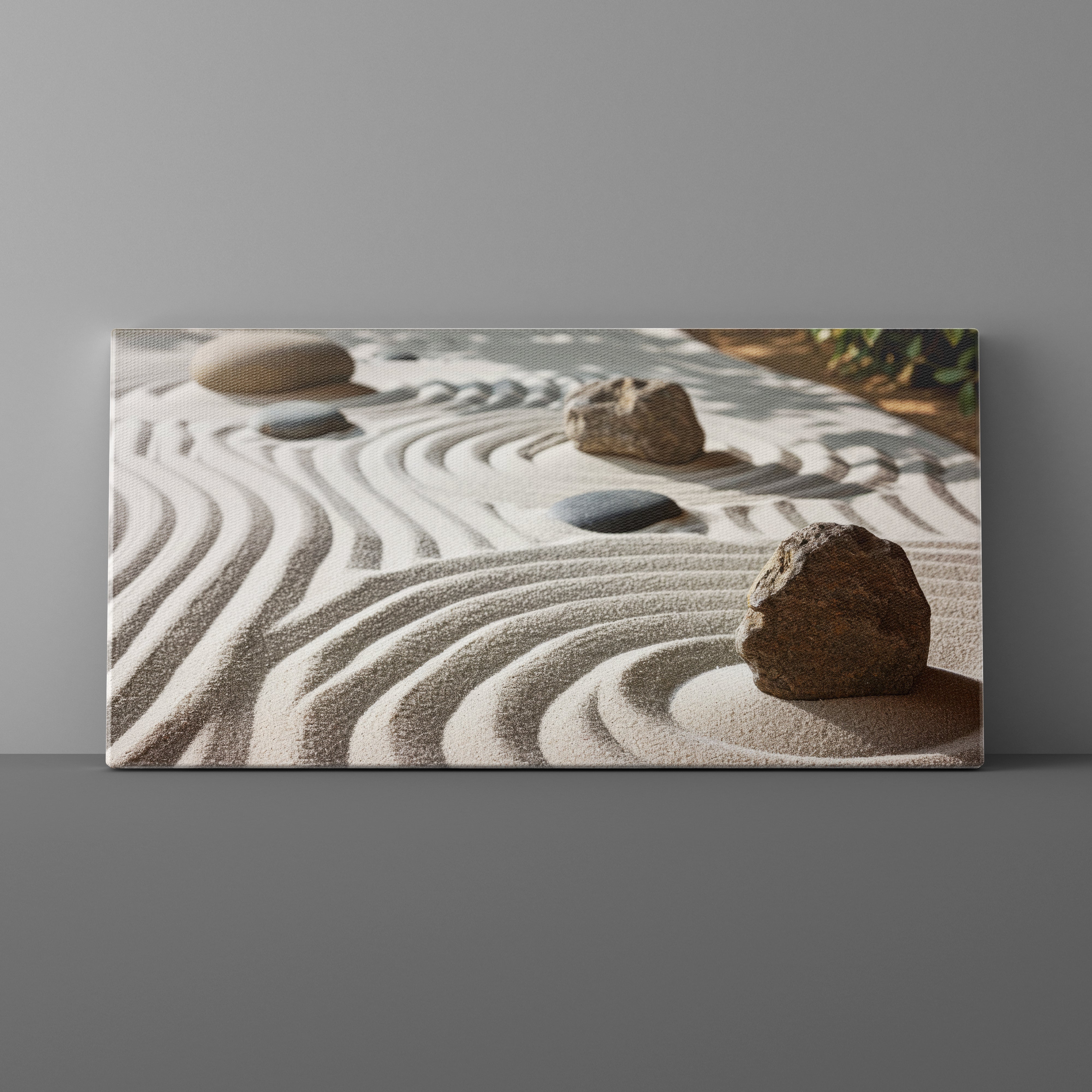 Canvas print of a zen garden with rocks and raked sand on a gray background