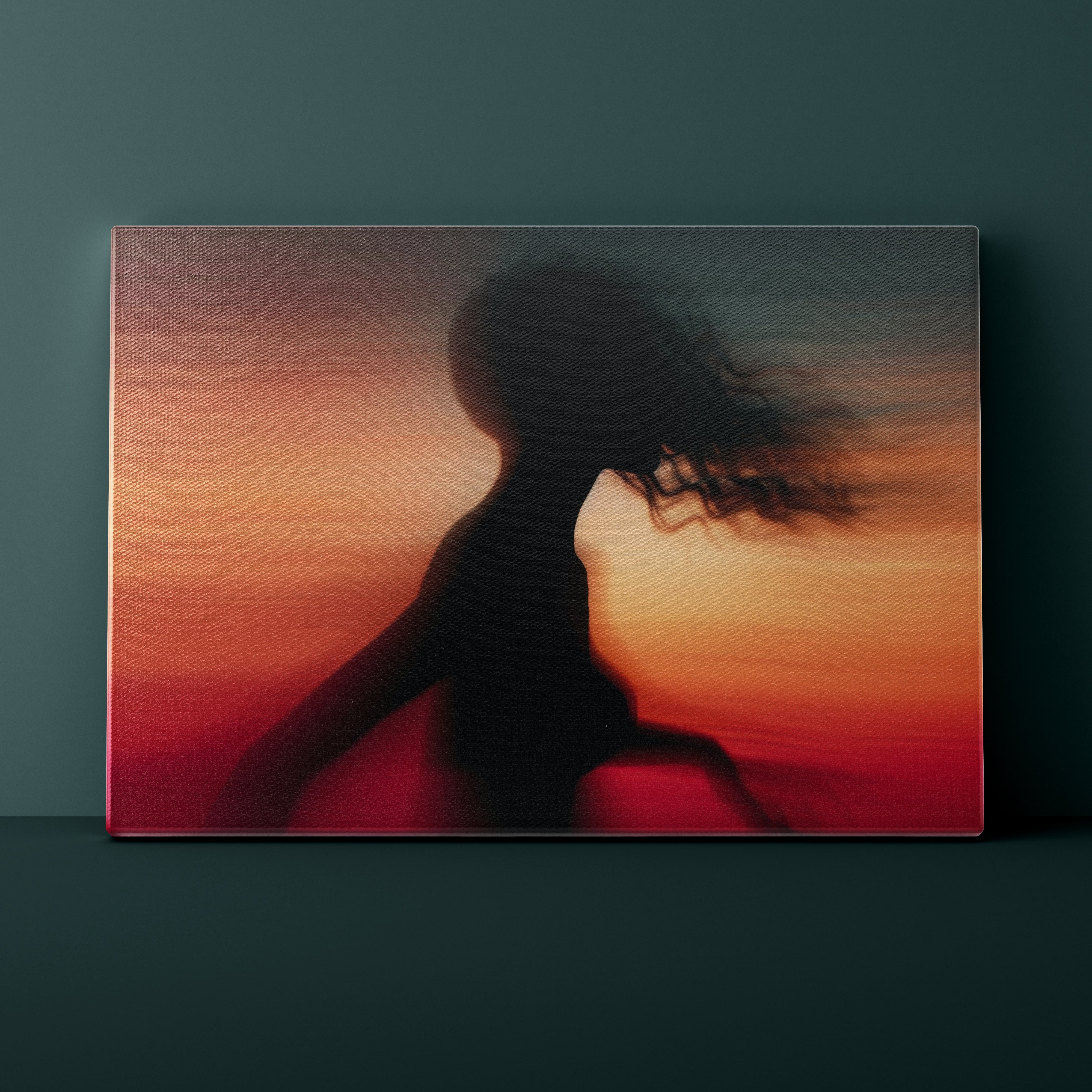 Canvas print of a silhouette against a sunset sky with a dark green background