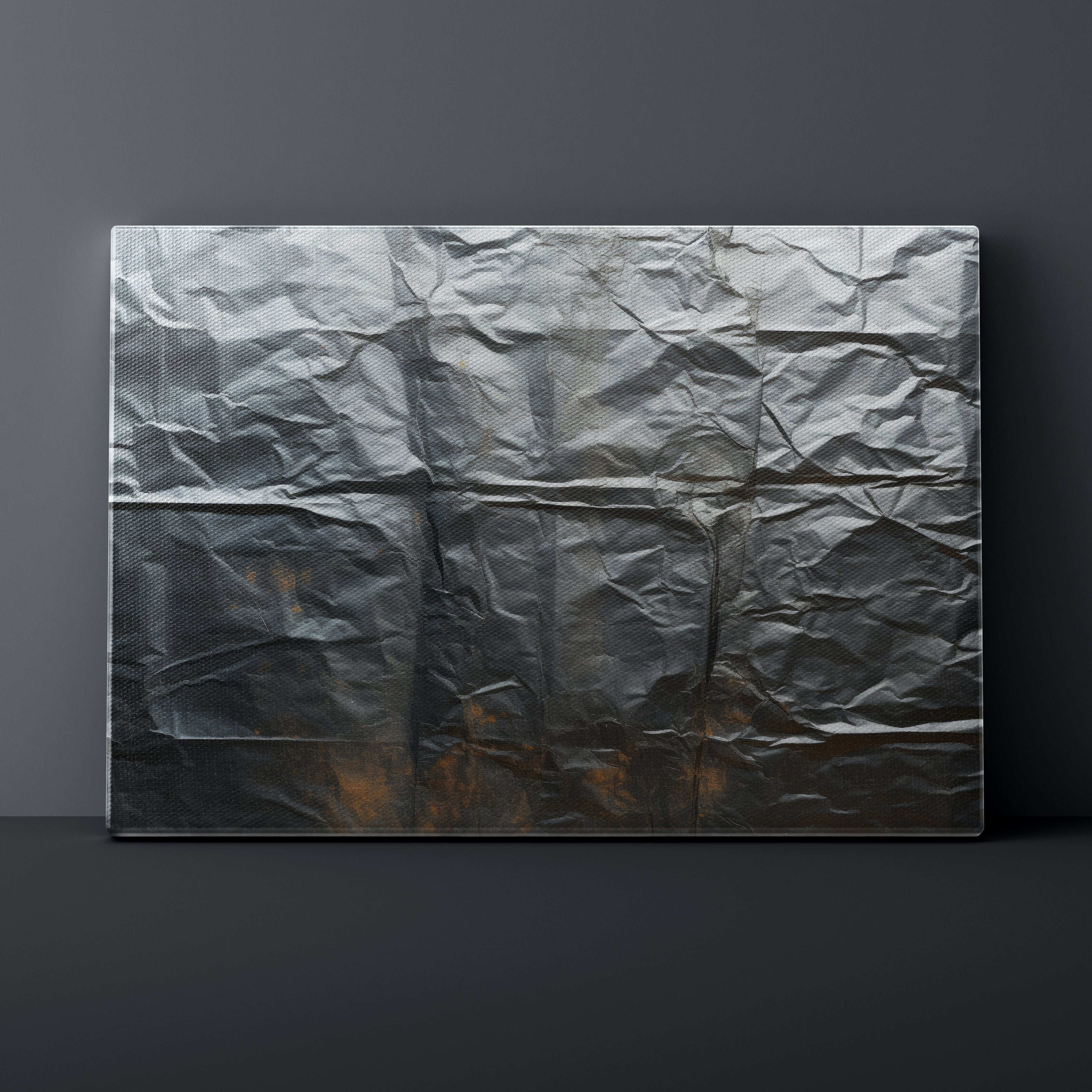 Textured black panel with a subtle pattern on a dark gray background