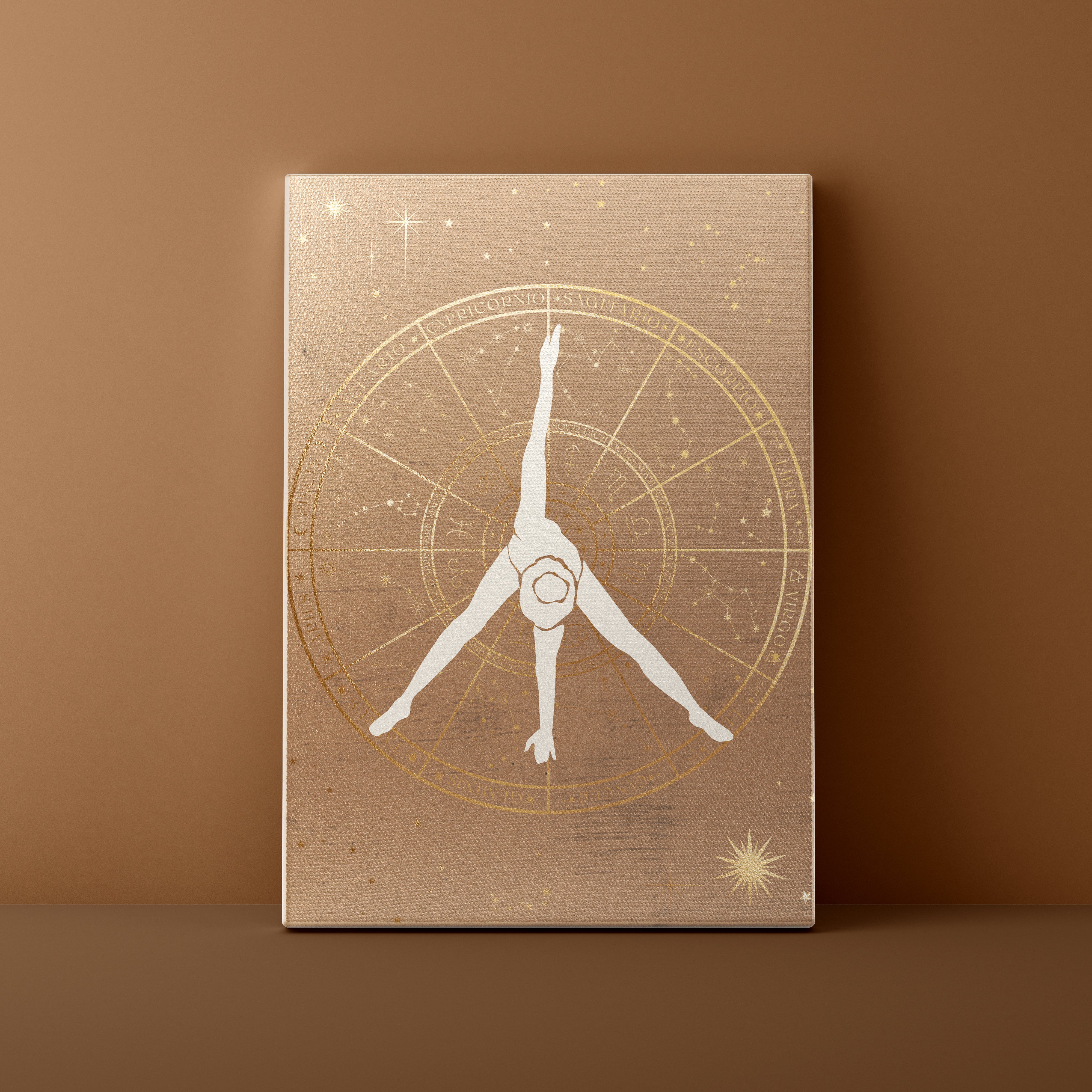 Canvas print with a white silhouette of a person in a yoga pose on a gold circular design against a brown background