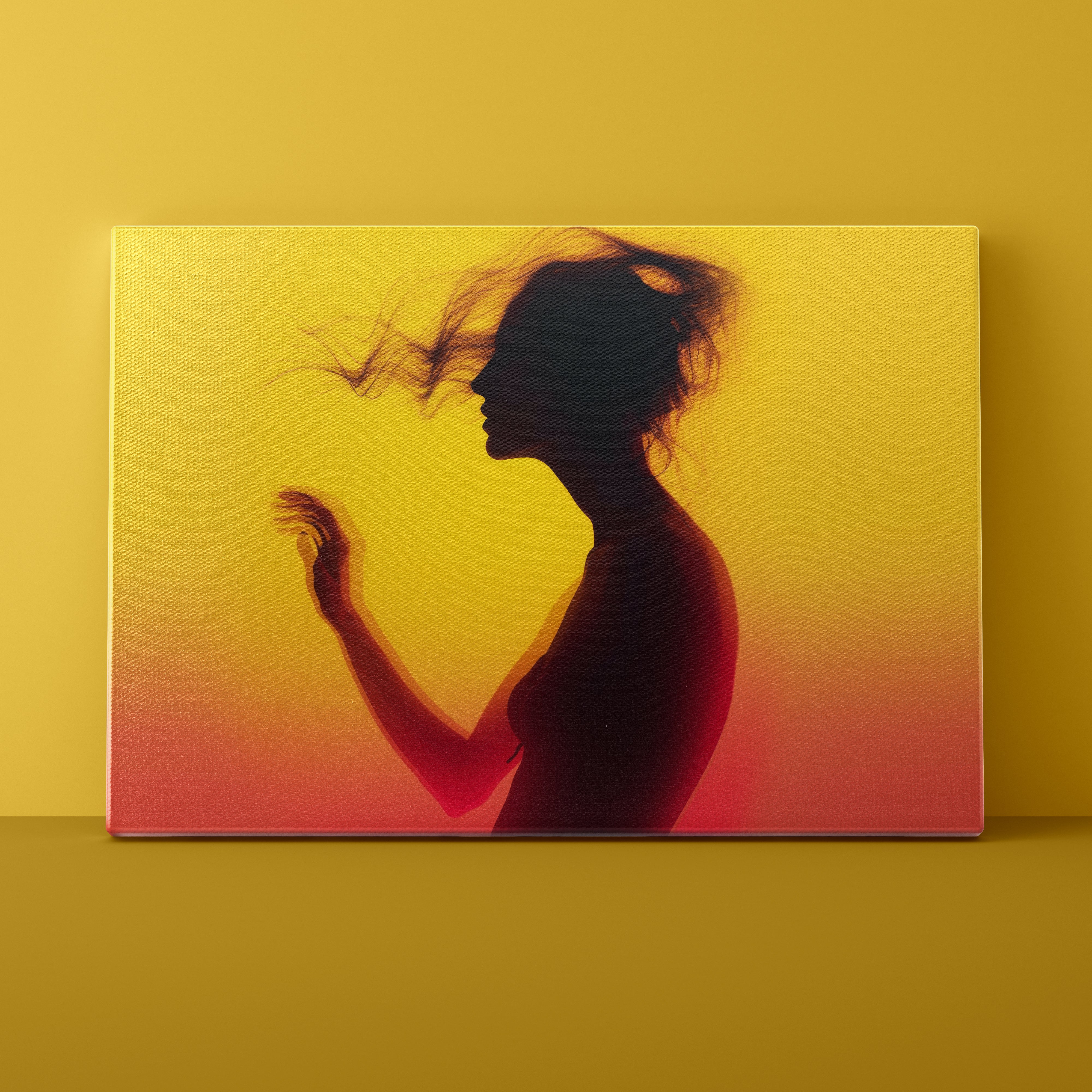 Silhouette of a woman against a gradient yellow to red background