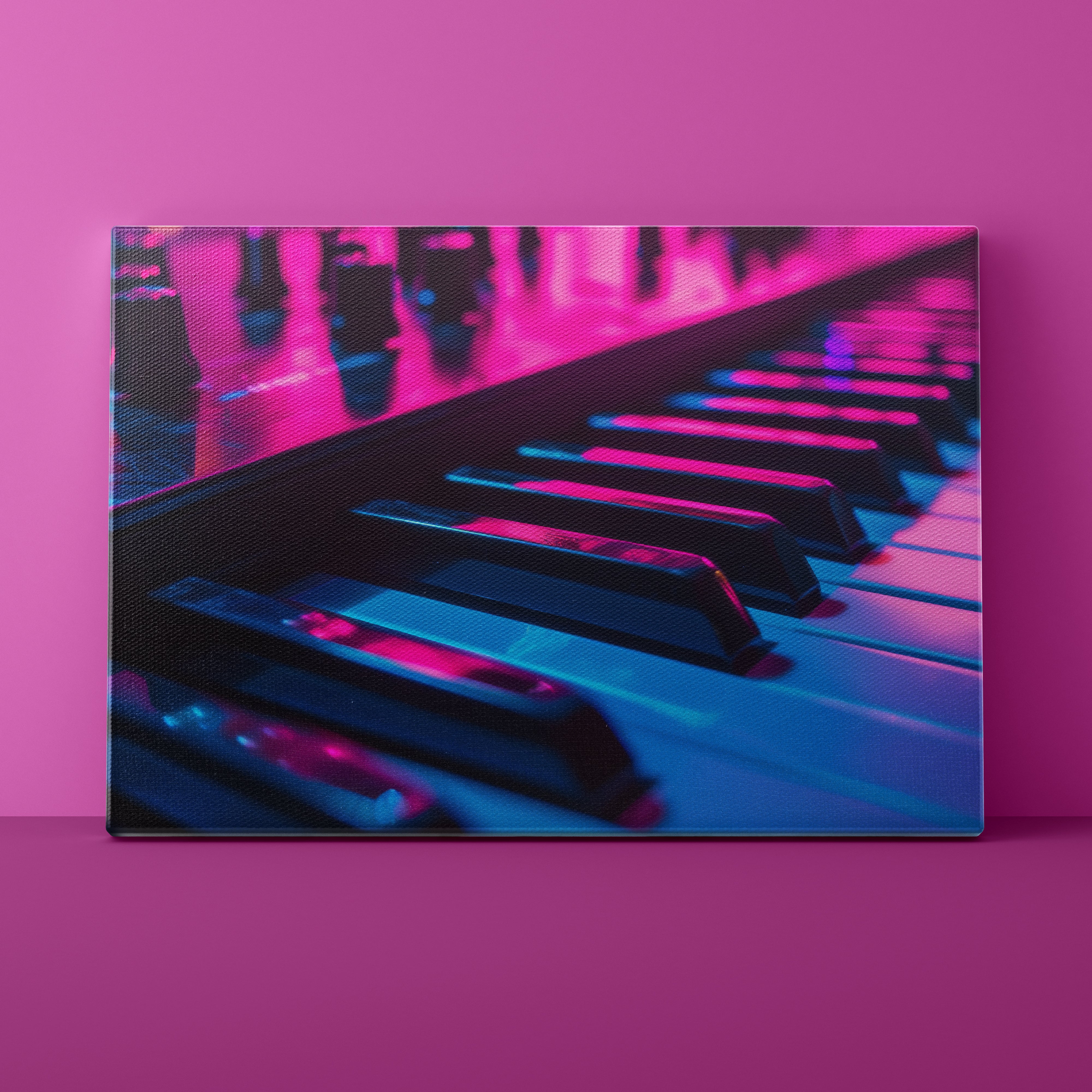 Close-up of a keyboard with pink and blue lighting on a pink background