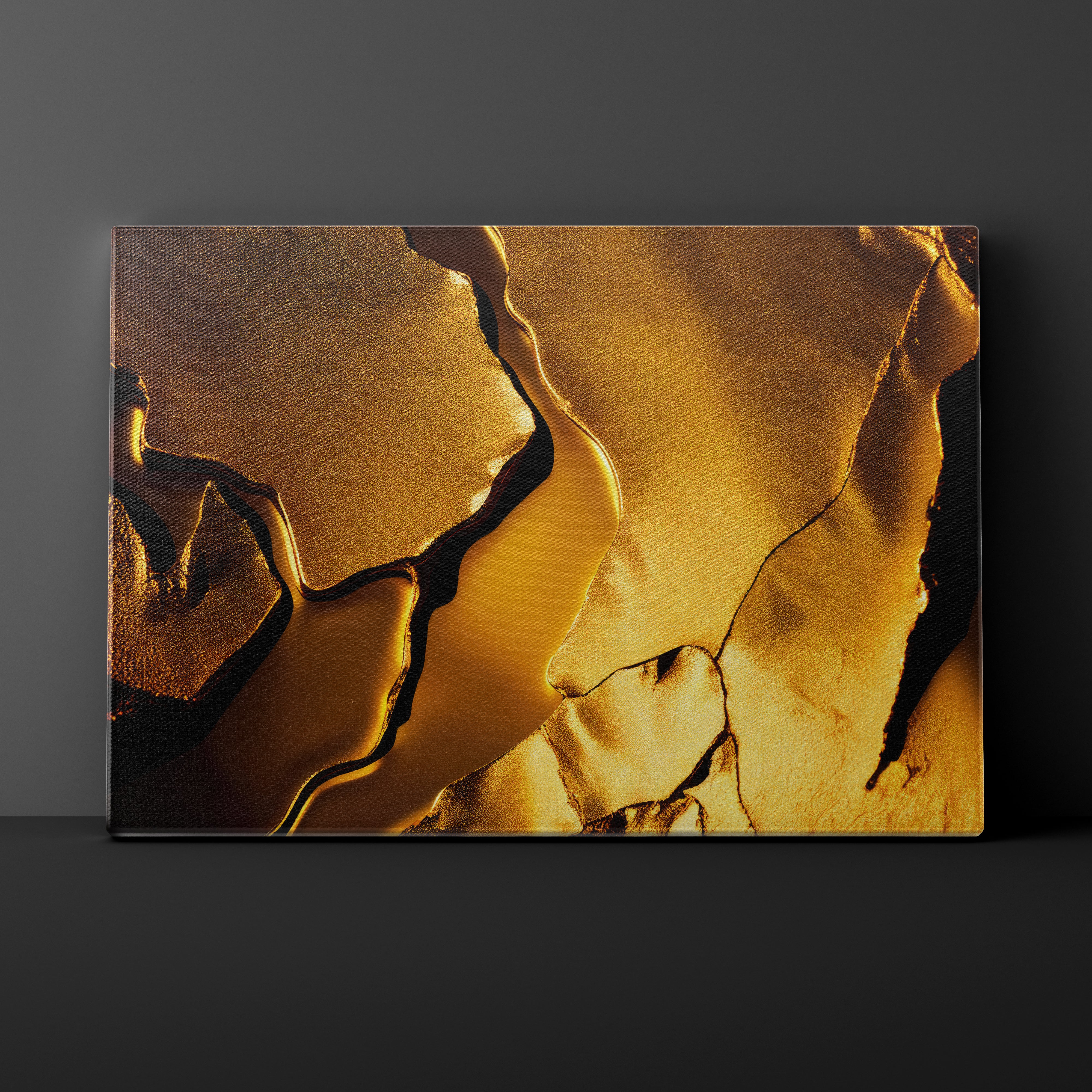 Abstract art piece with gold and black patterns on a dark background