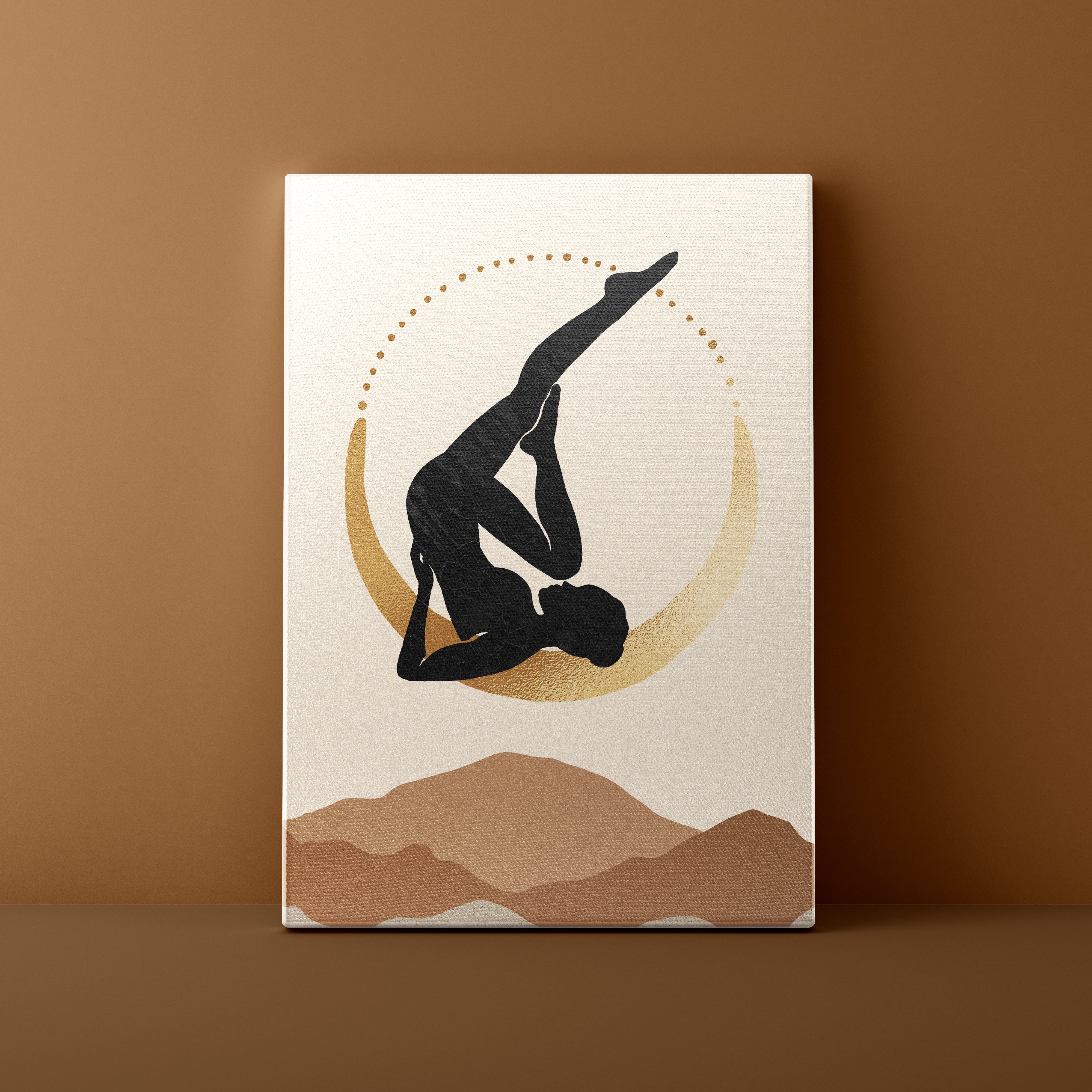 Canvas print with a silhouette of a person in a yoga pose against a mountain and moon design on a beige background.