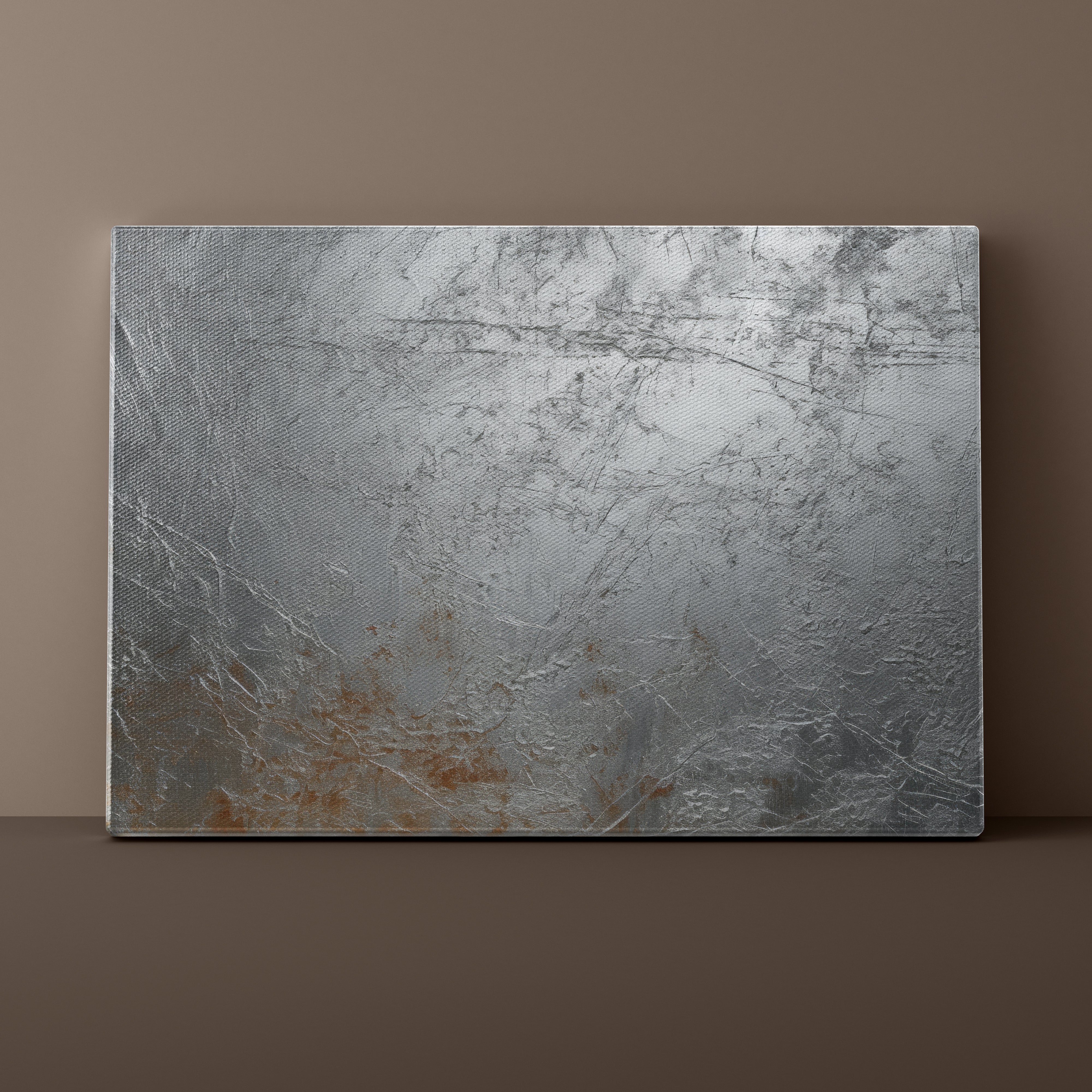 Textured metal panel on a brown background