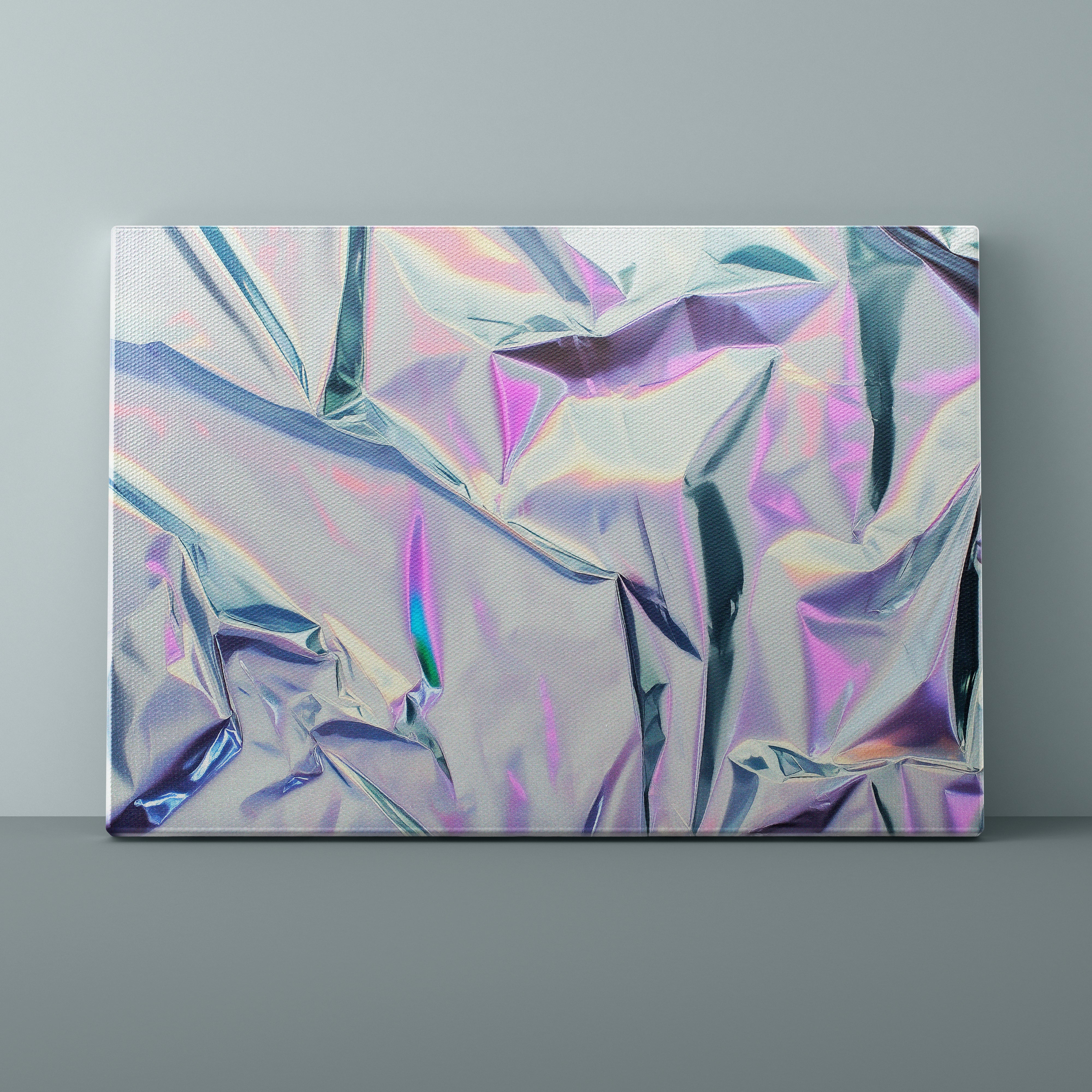 Abstract multicolored pattern on a canvas against a gray background