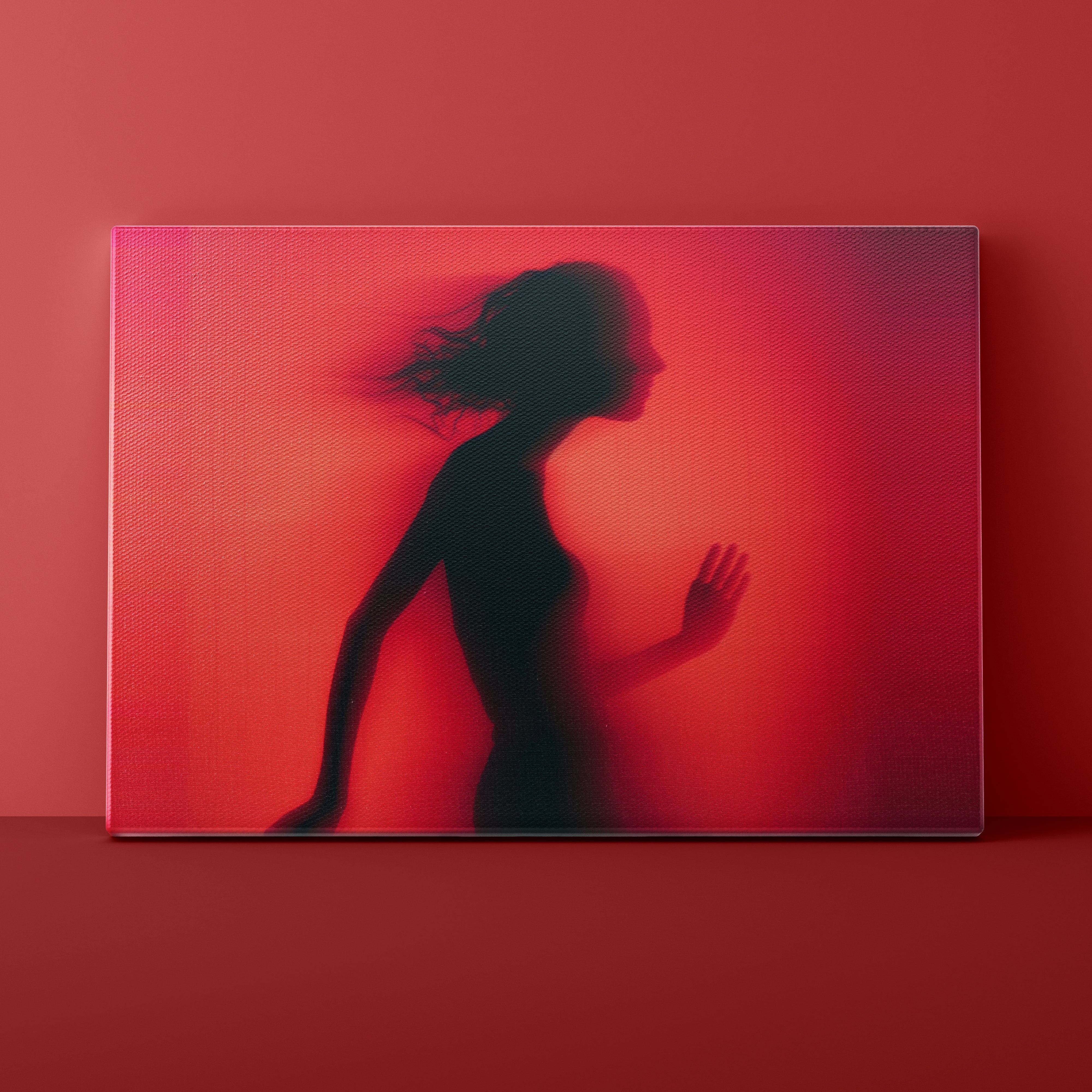 Silhouette of a woman against a red gradient background
