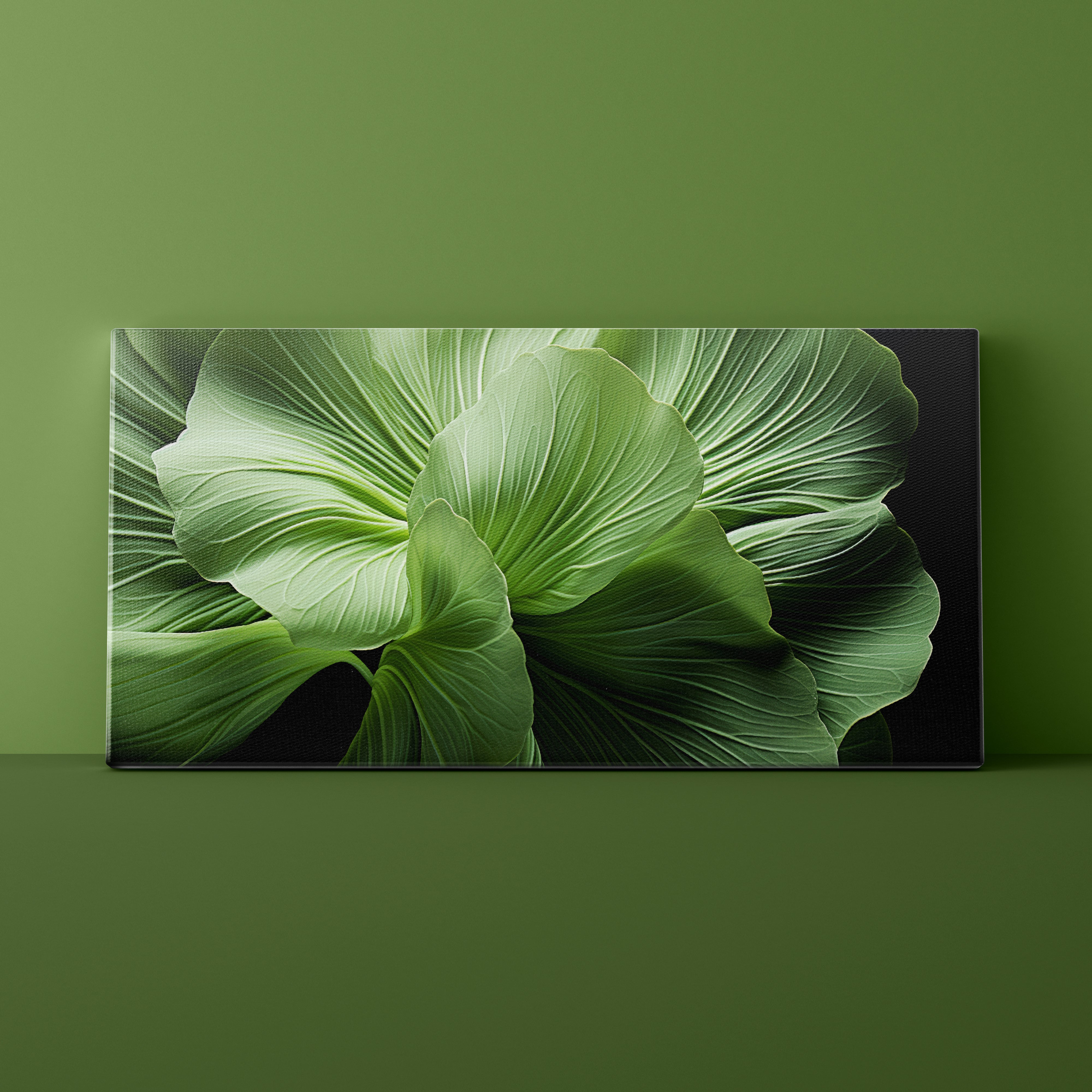 Canvas print of green leaves on a green wall