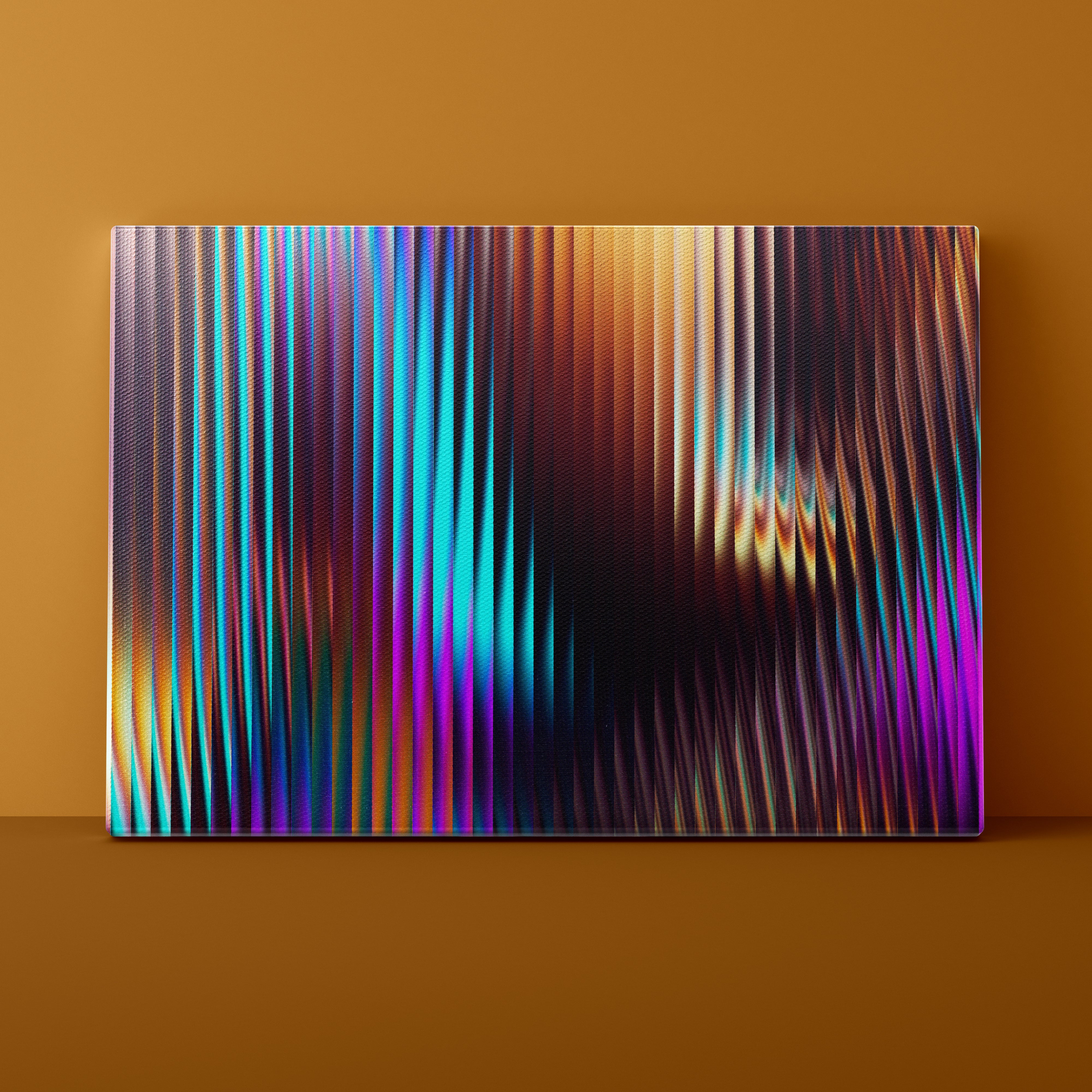 Colorful abstract pattern on a rectangular object against a brown background