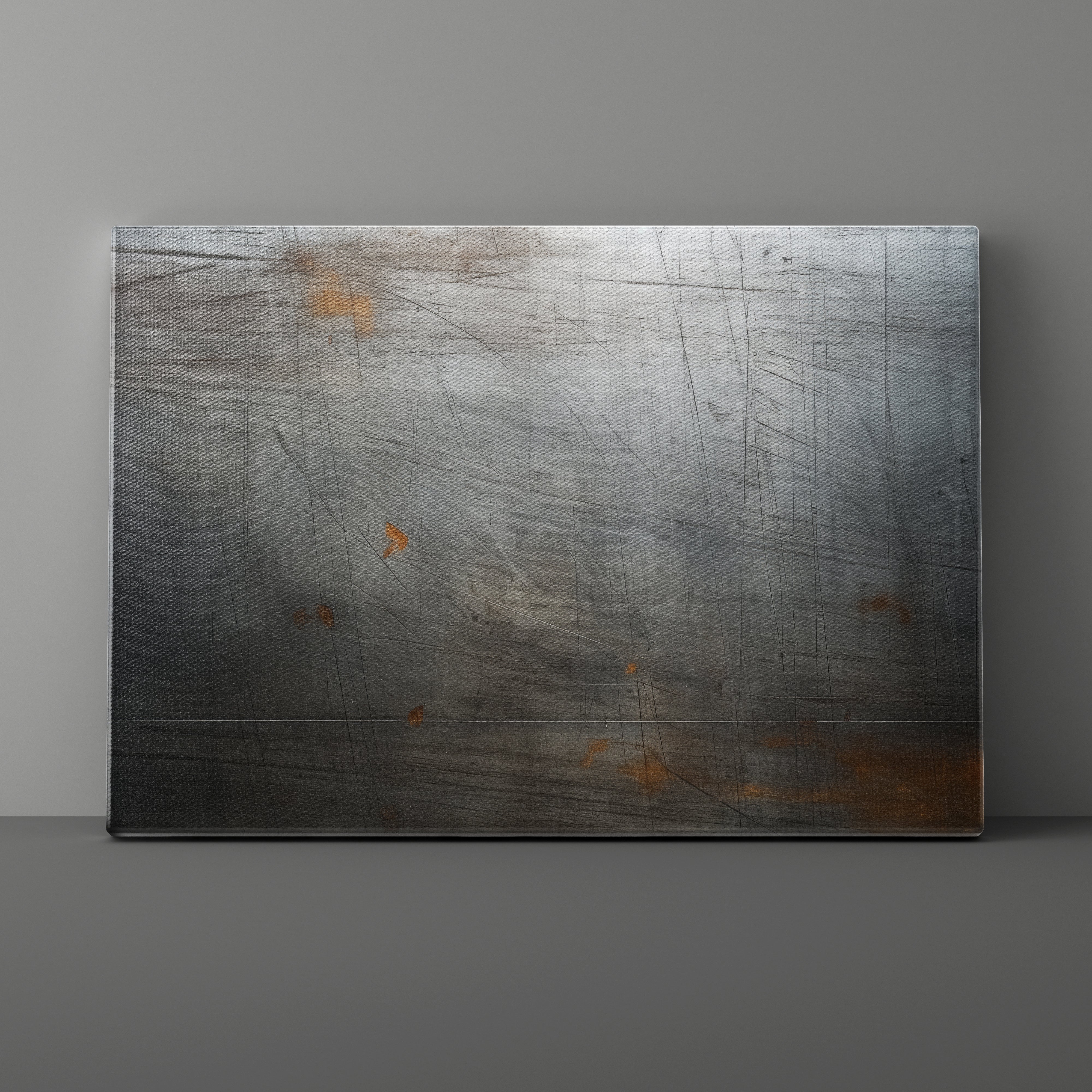 Metallic panel with textured surface on a gray background
