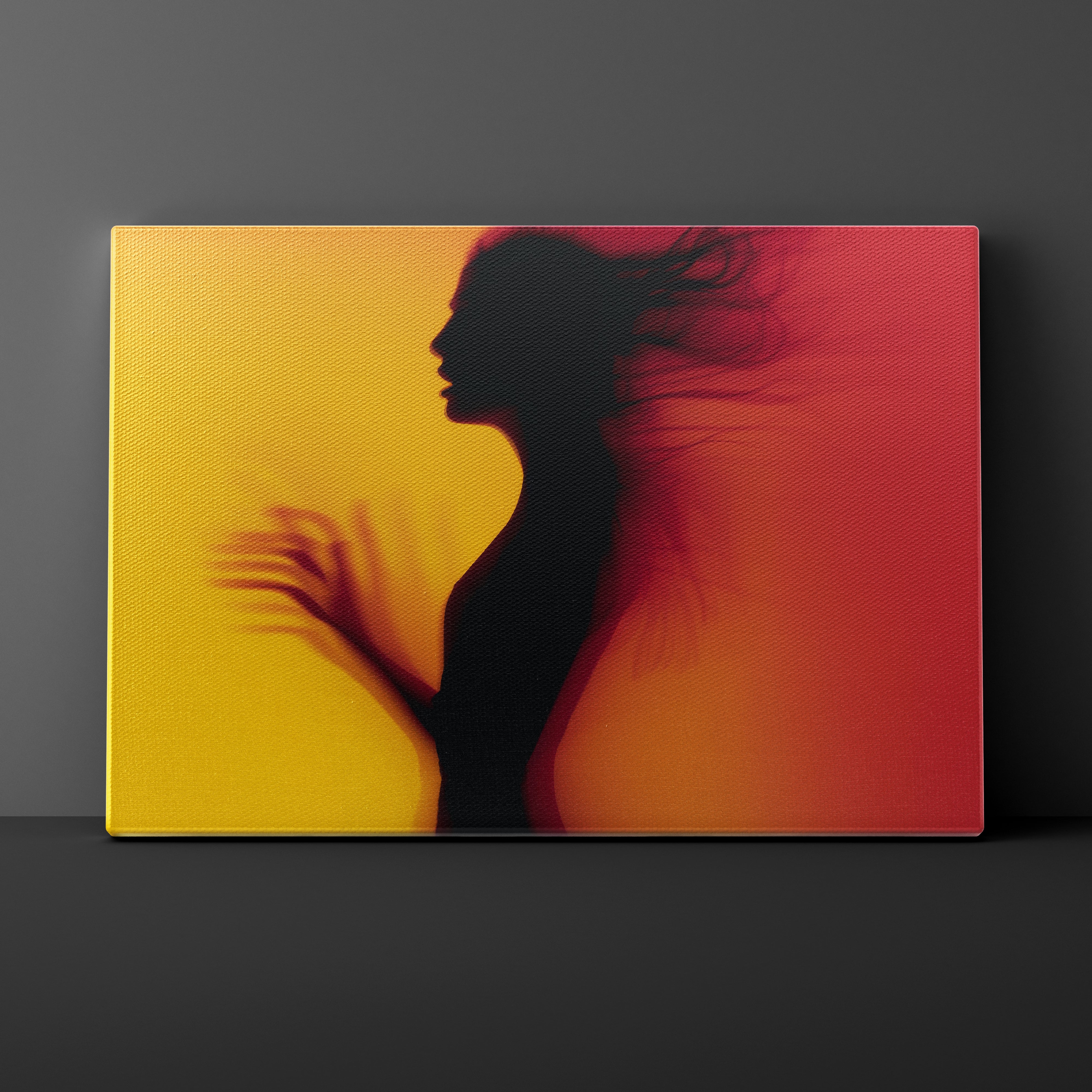 Canvas print with a silhouette of a woman against a yellow and red gradient background