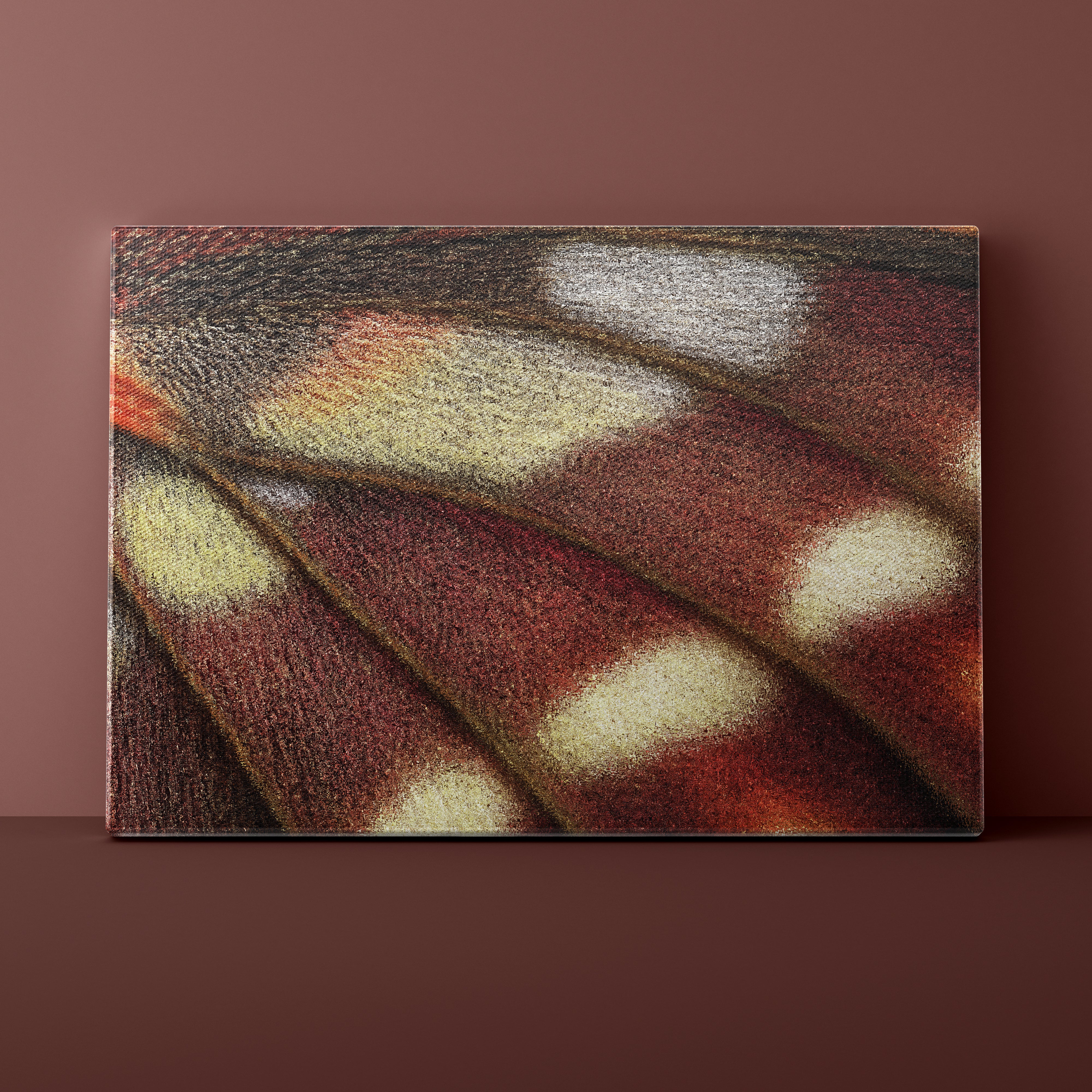 Close-up of a butterfly wing with red, white, and brown colors on a brown background