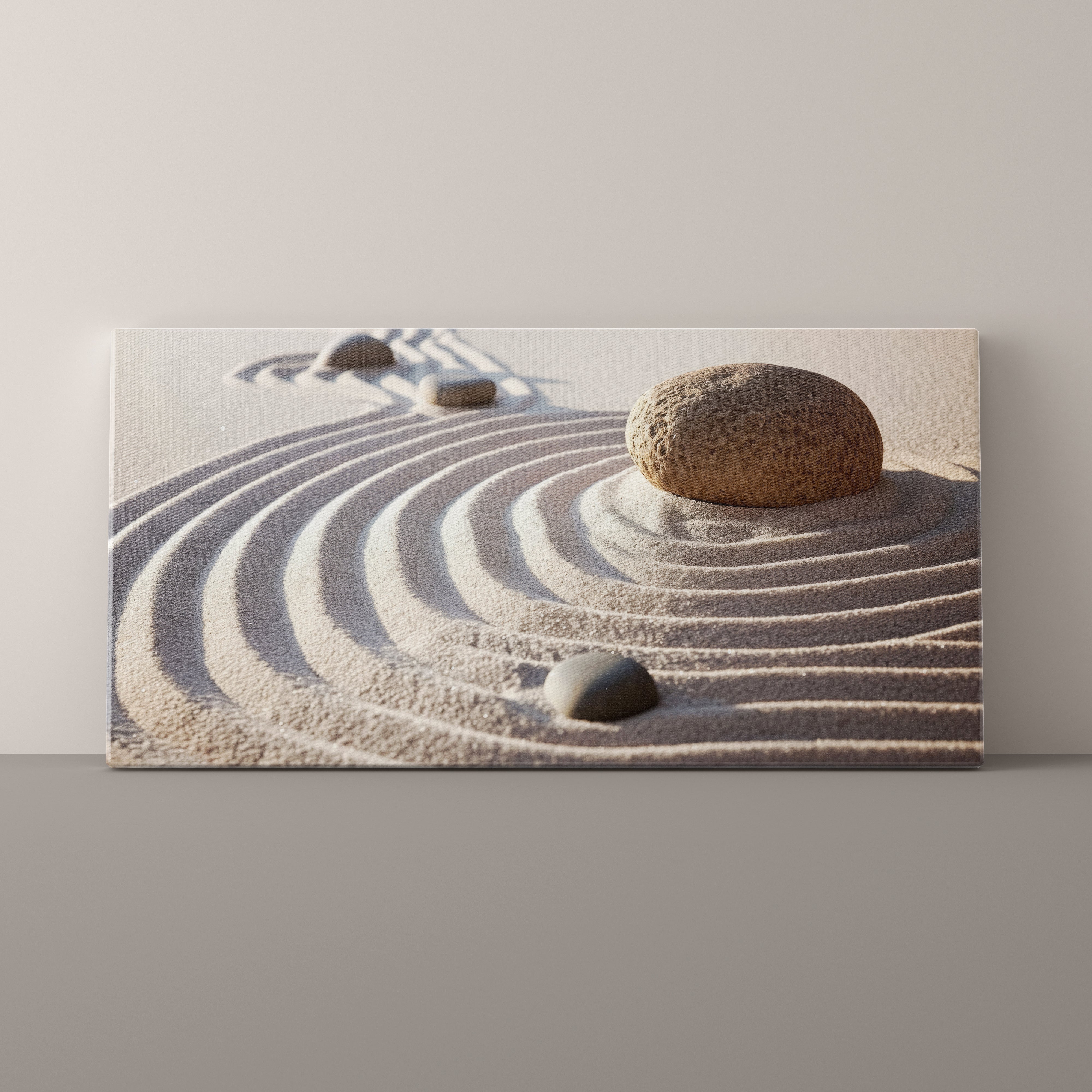 Canvas print of a minimalist scene with stones and sand on a plain background