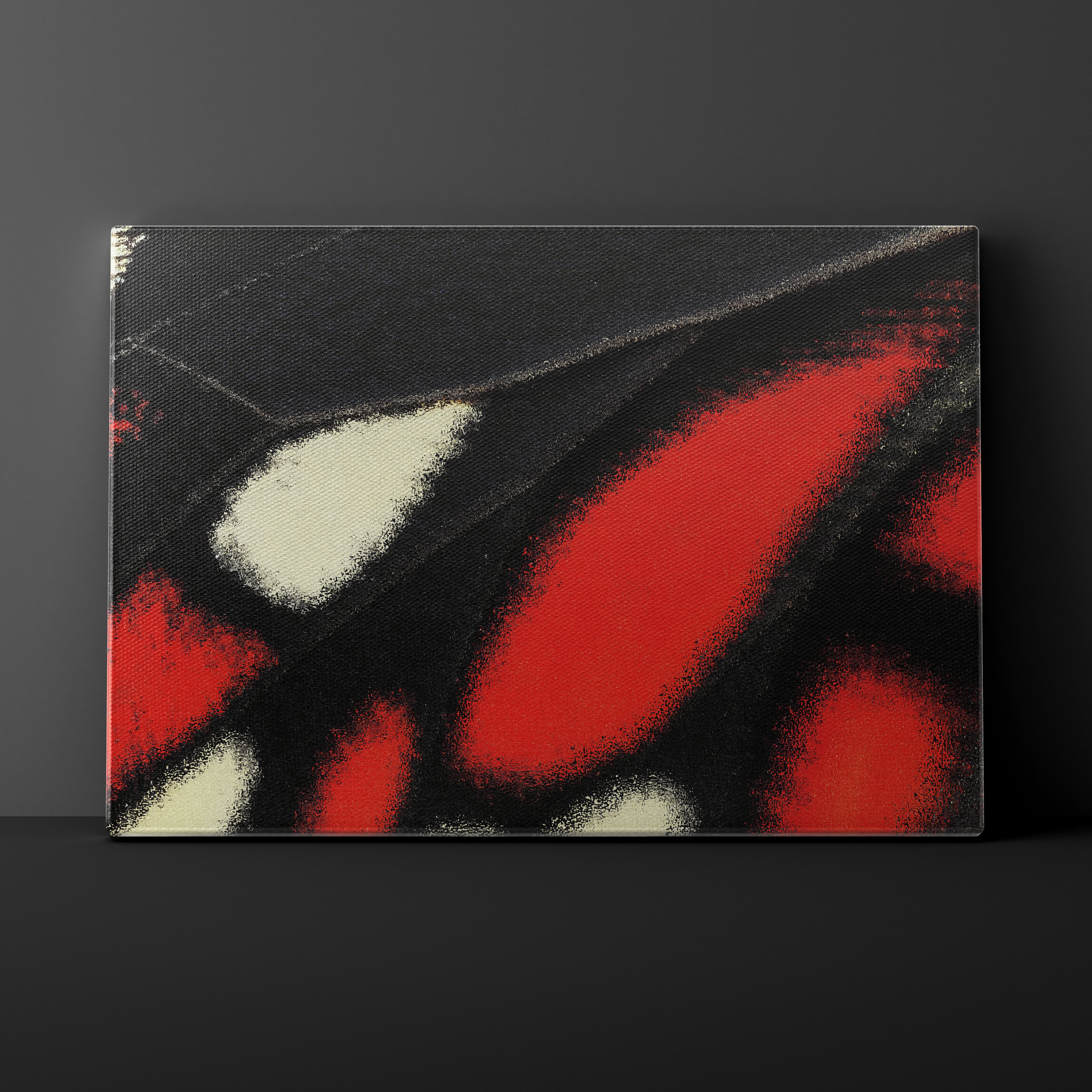 Abstract art piece with red, black, and white colors on a dark background