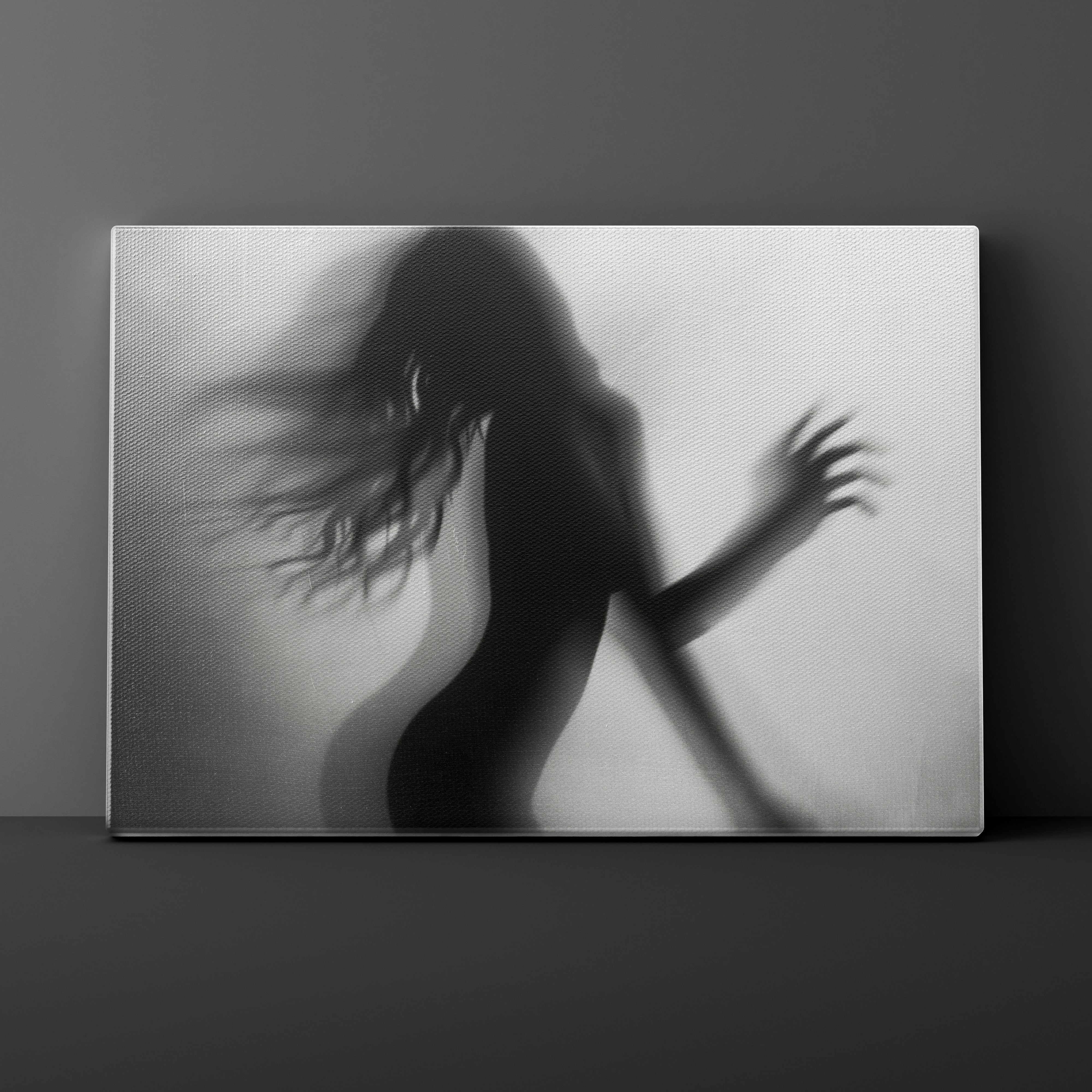 Canvas print of a silhouette against a textured wall