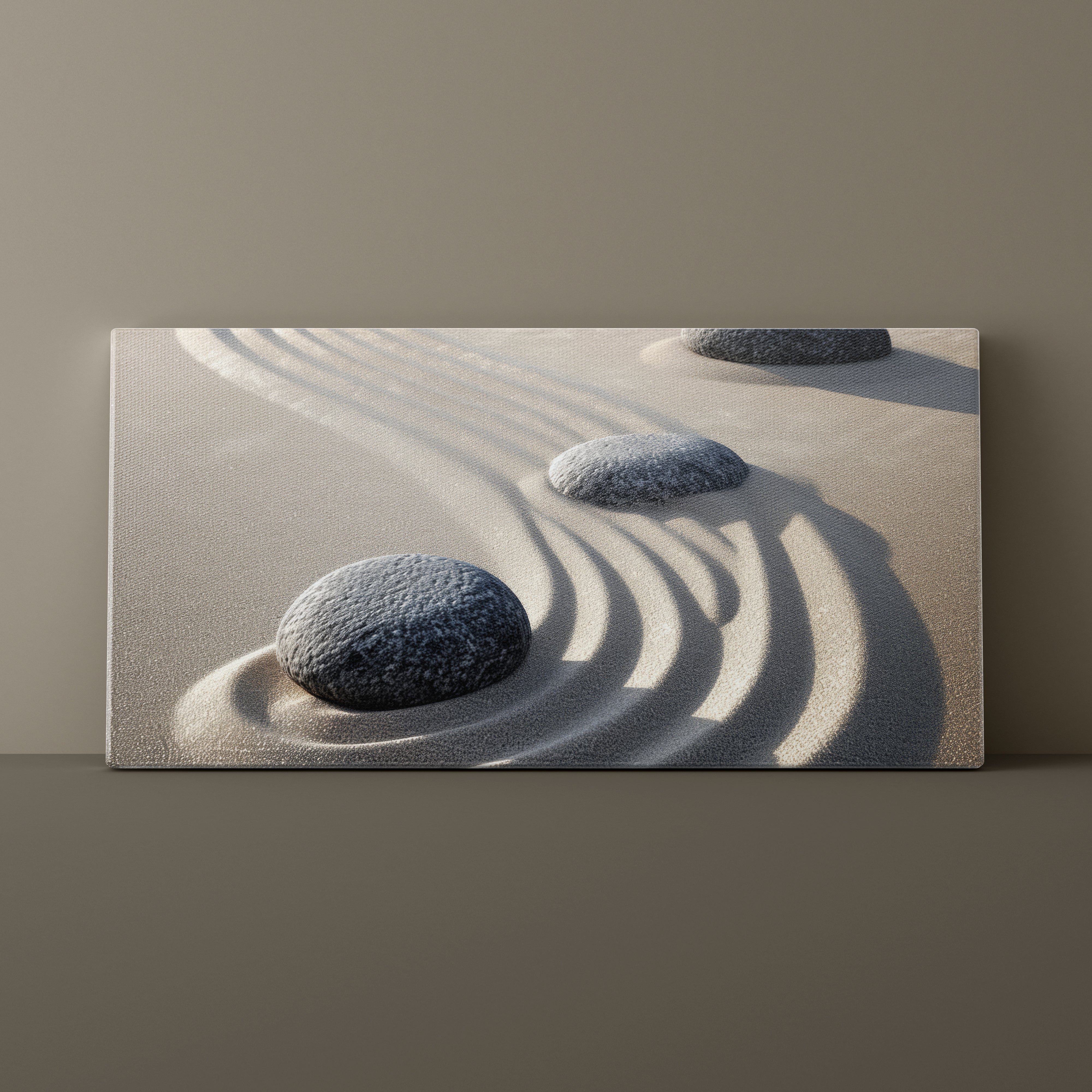 Canvas print of pebbles on sand with wavy lines against a beige background