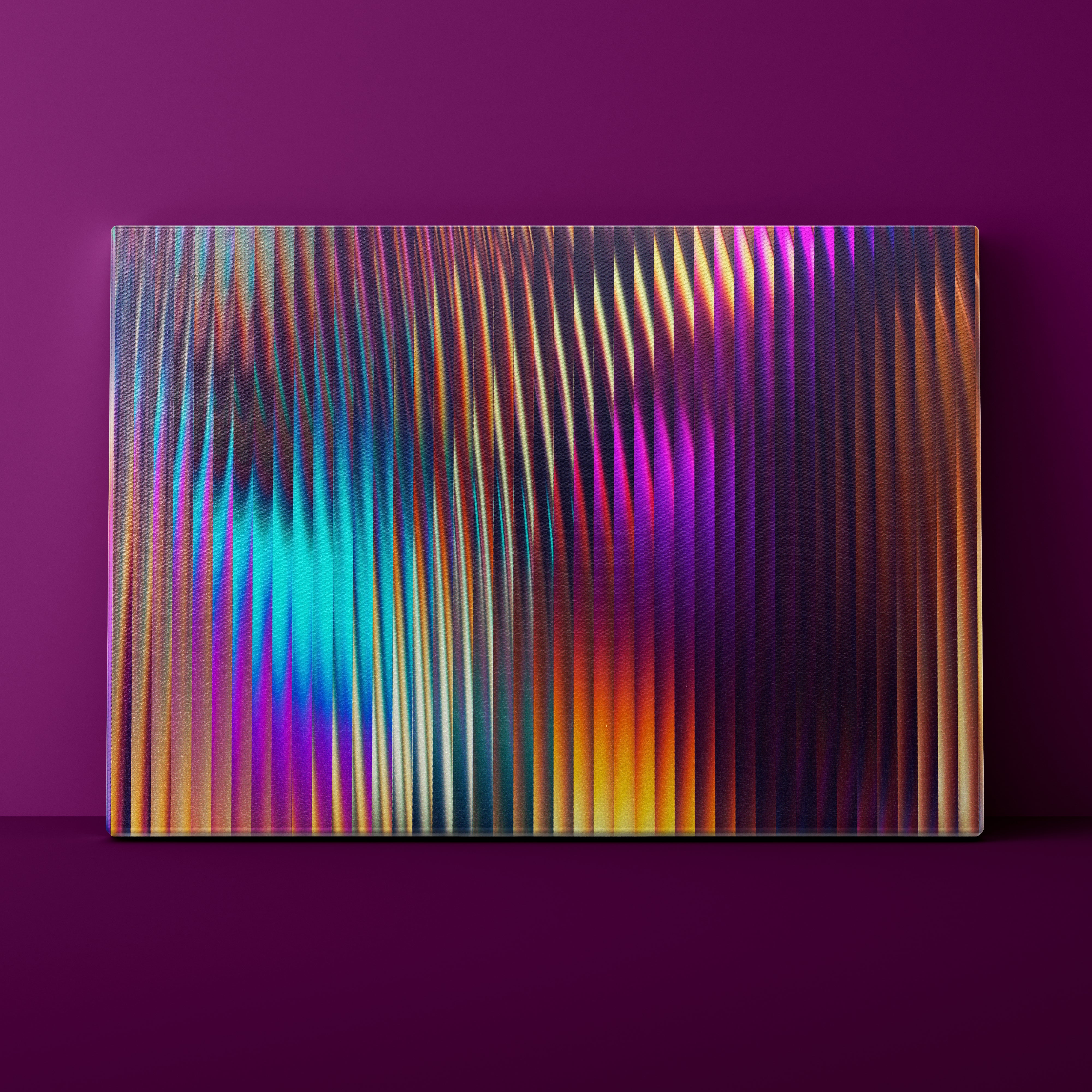 Colorful abstract pattern on a rectangular object against a purple background