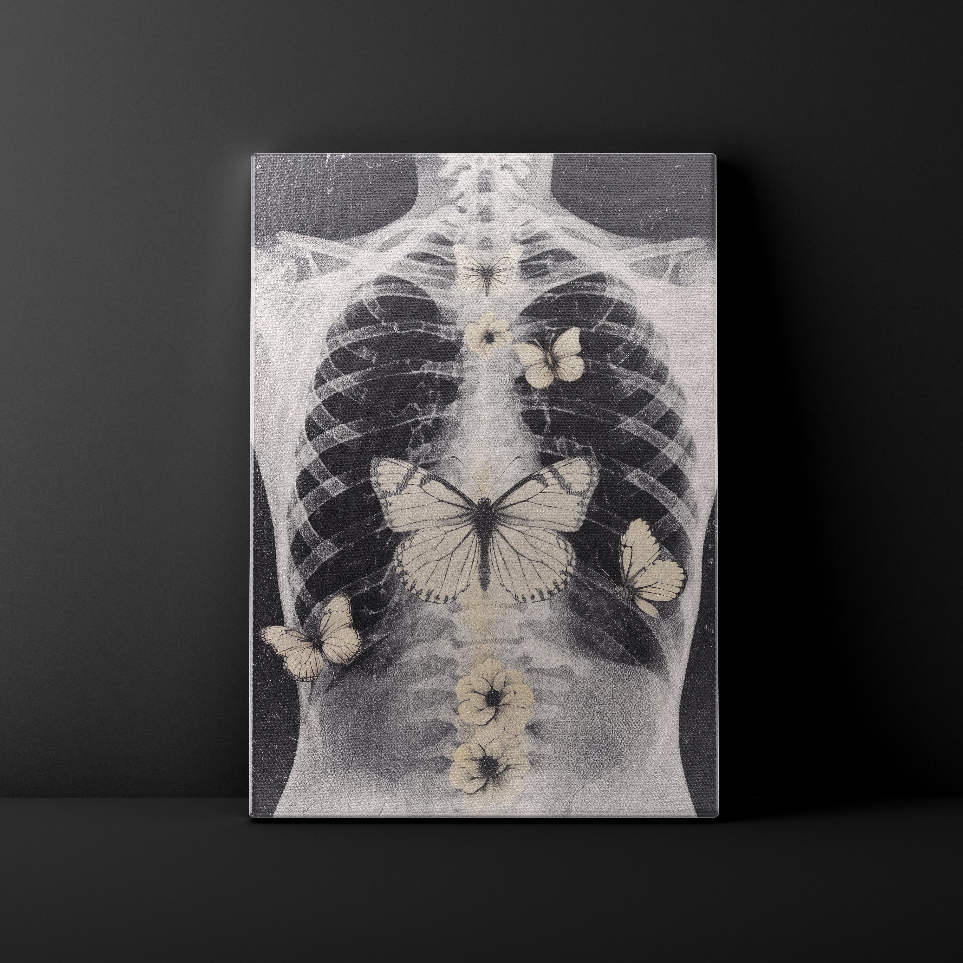 X-ray of a ribcage with butterflies and flowers on a black background