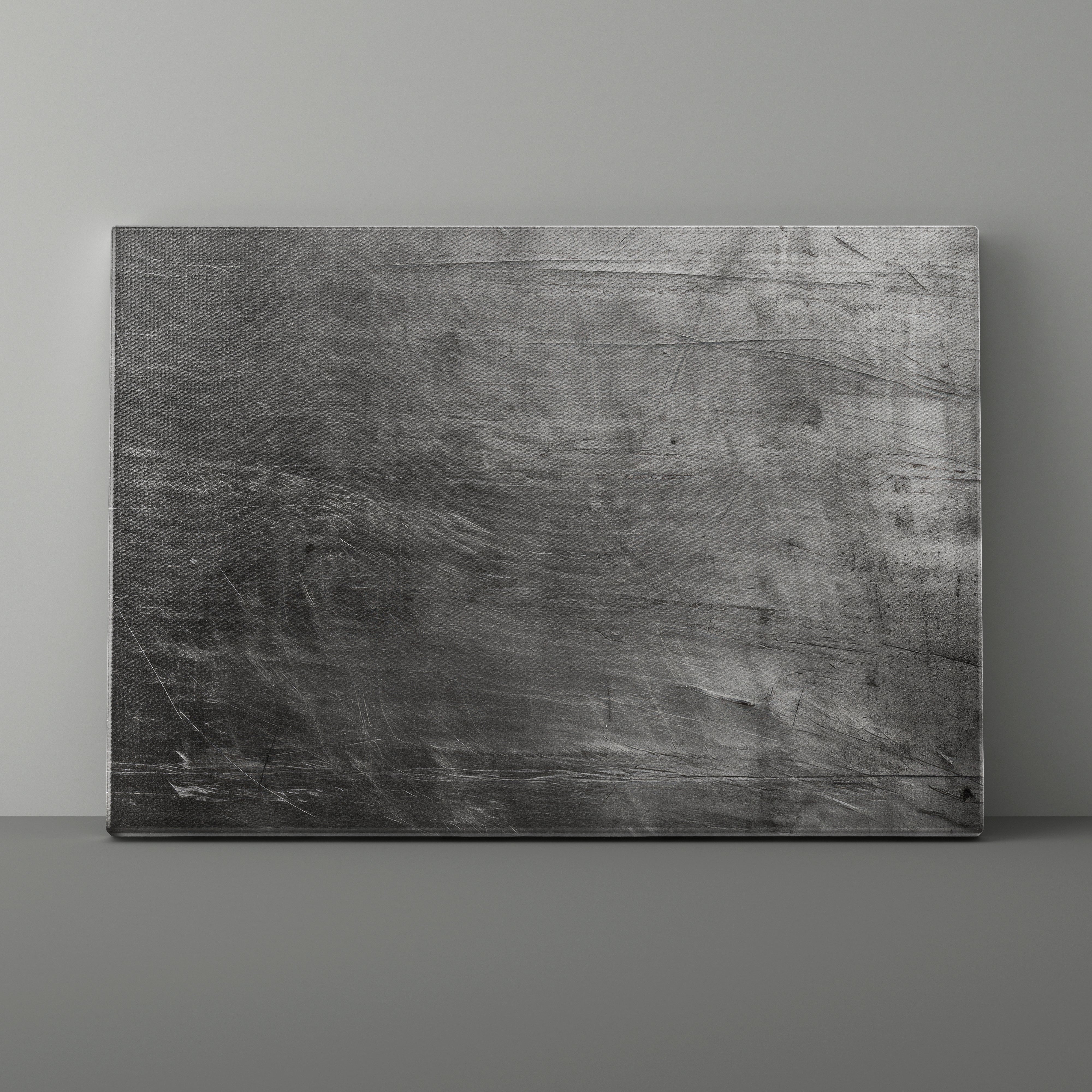 Textured black panel against a gray background