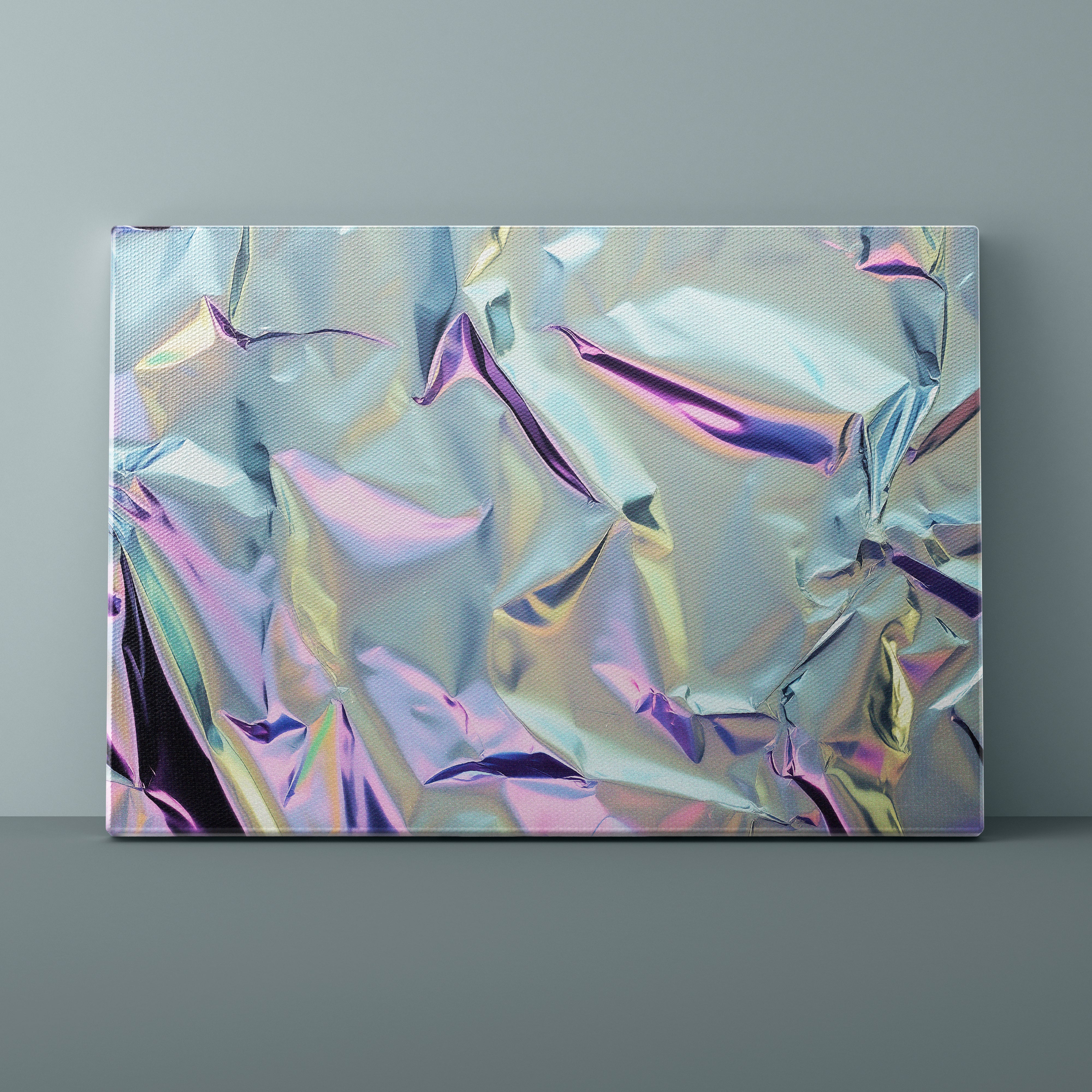 Abstract art piece with metallic, iridescent patterns on a gray background